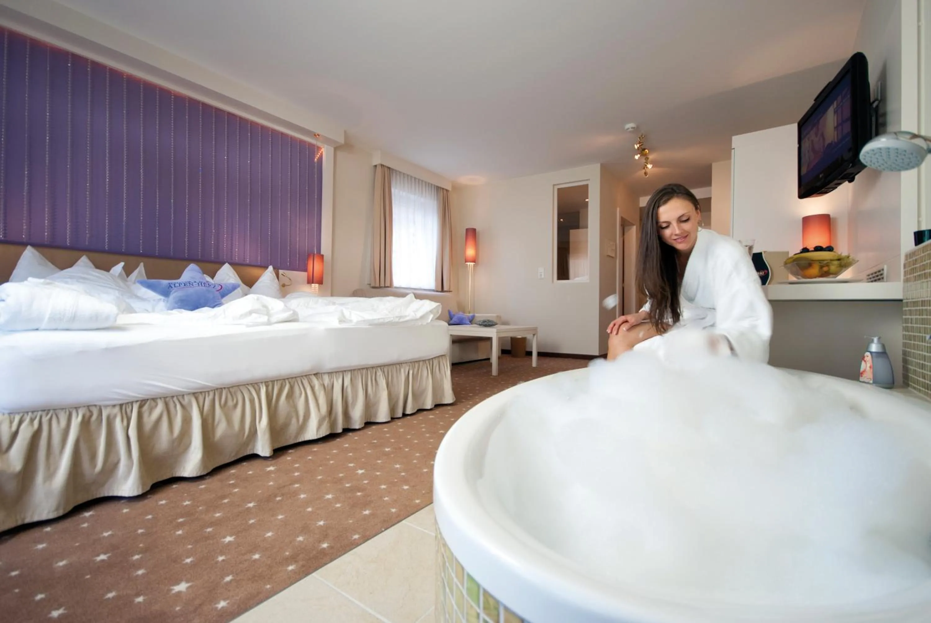 Living room, Bed in Alpen-Herz Romantik & Spa - Adults Only