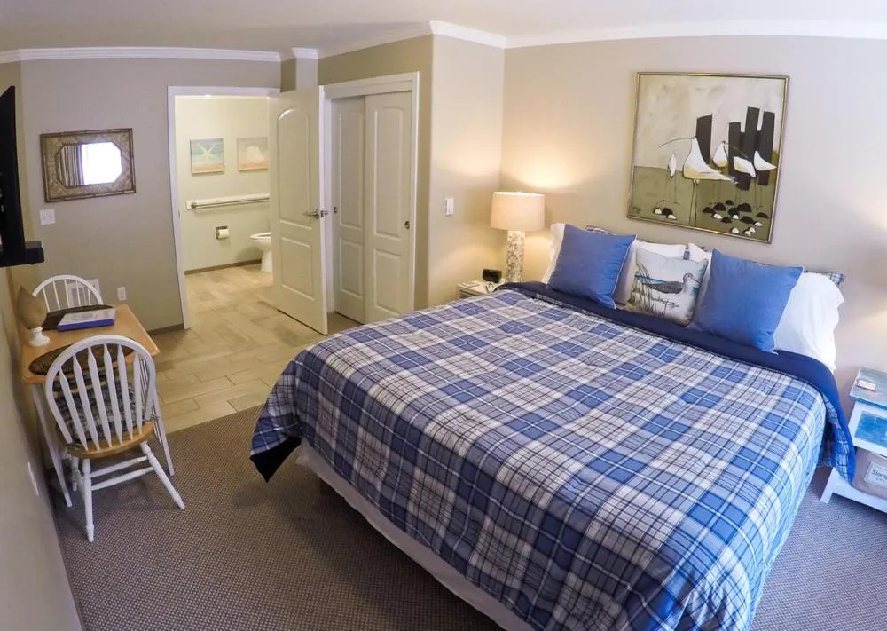 Bed in Capitola Beach Suites