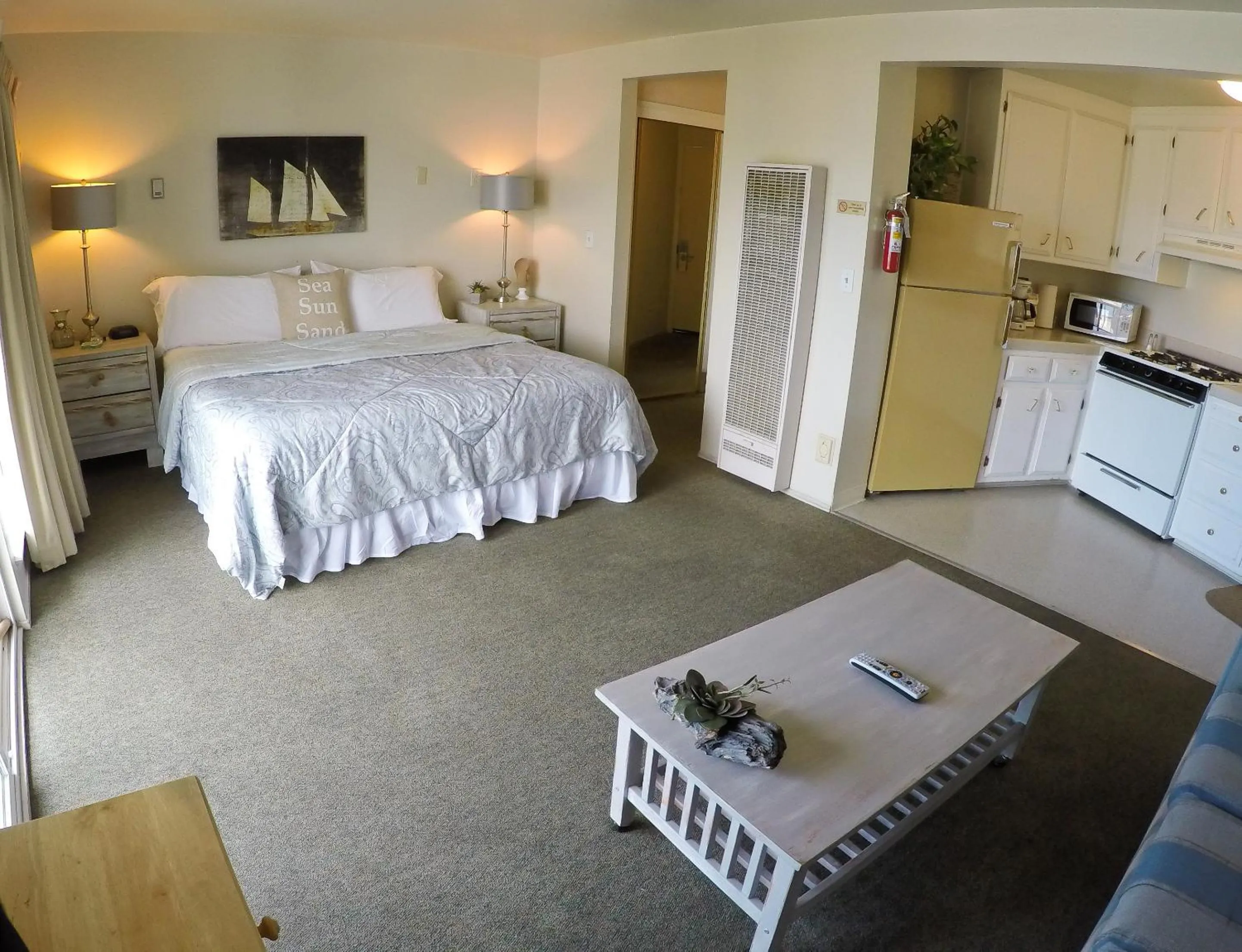 Bed in Capitola Beach Suites
