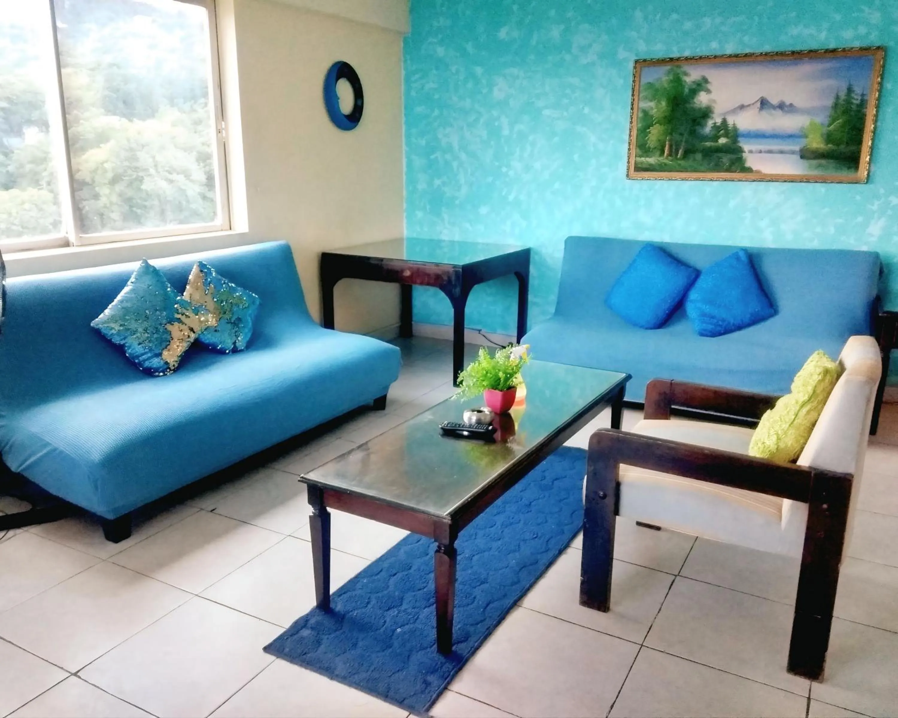 Living room in Beach-side condos at Turtle Beach Towers