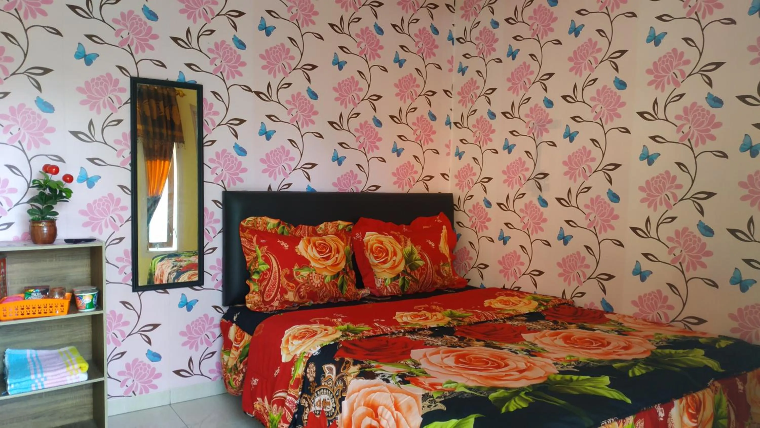 Bed in Penginapan Kahan