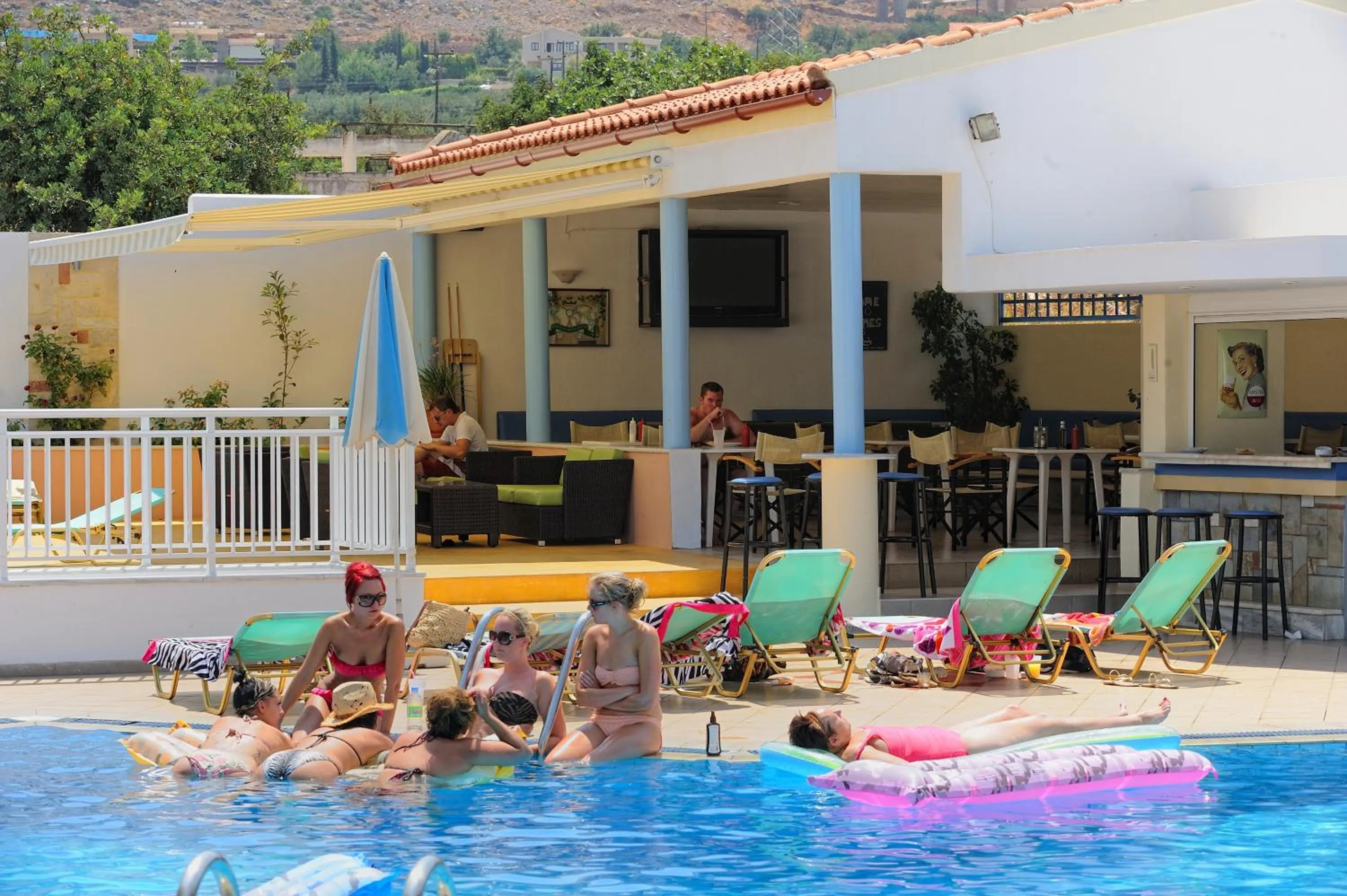 Swimming pool in Melissa Apartments, Studios & Suites