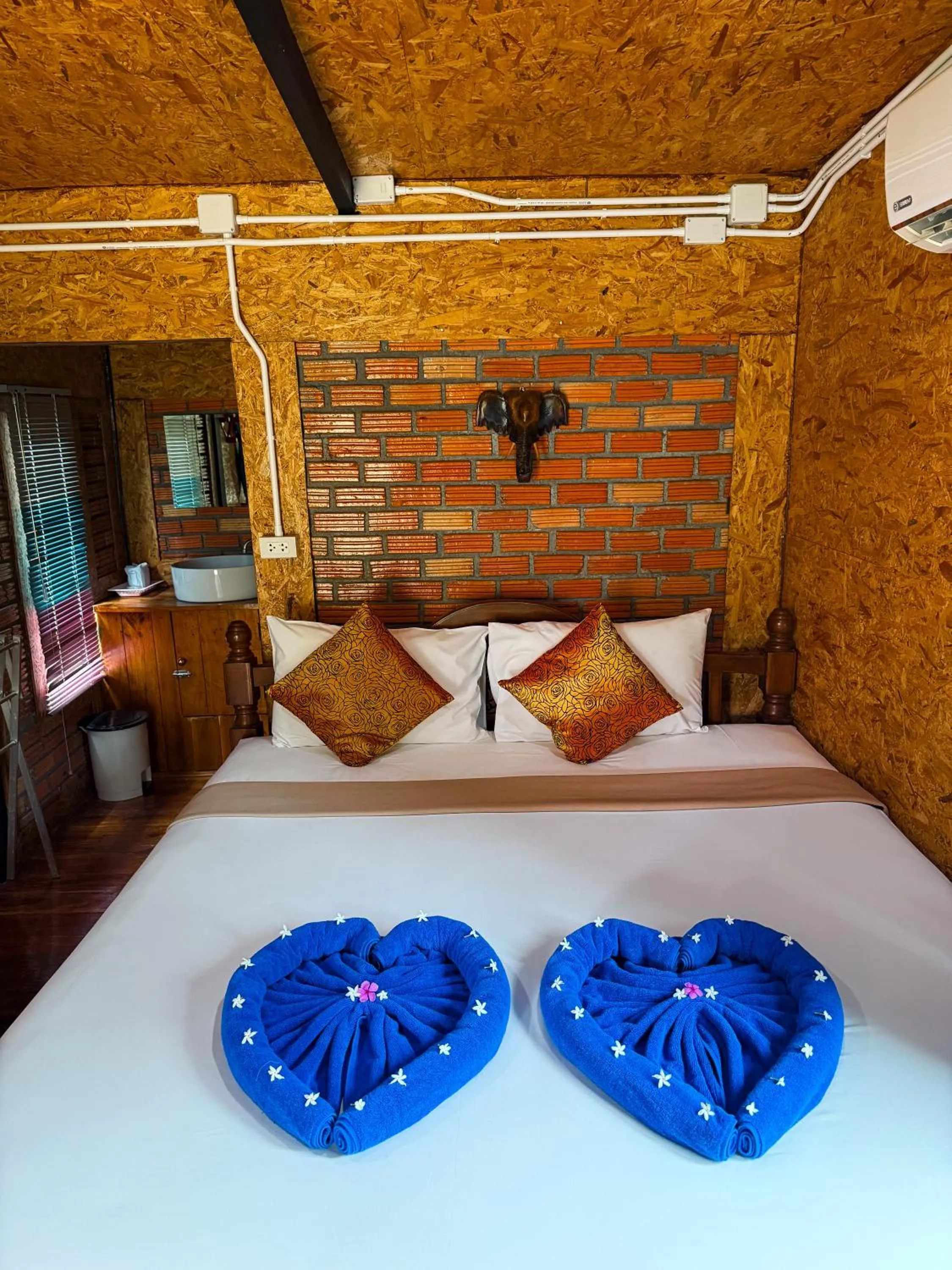 Bed in Mook Tamarind Resort