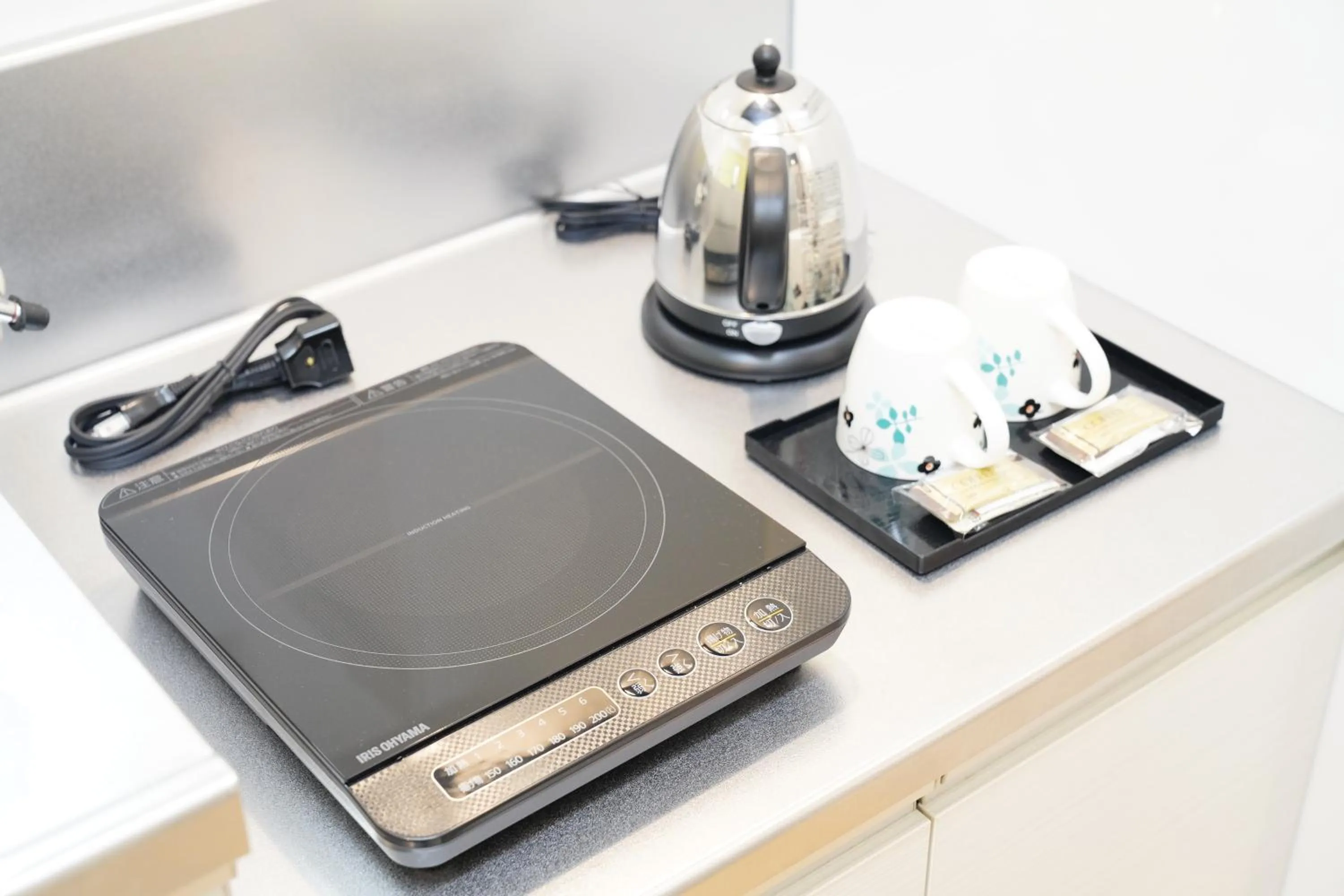 Kitchen or kitchenette in Condominium GOLF GOLF Tsuboya