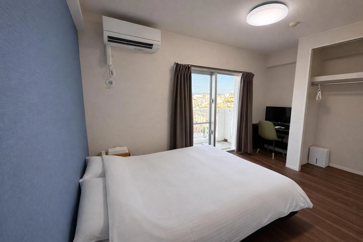 Bedroom, Bed in Condominium GOLF GOLF Tsuboya