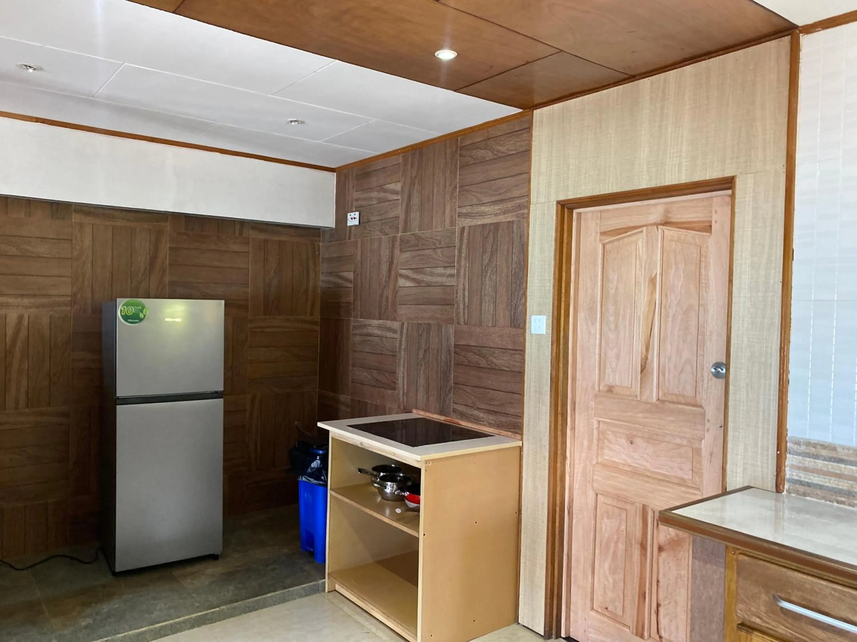 Communal kitchen in Mouggae Blues Villas