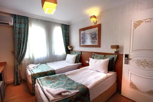 Bedroom, Bed in Agora Boutique Hotel & Bistro