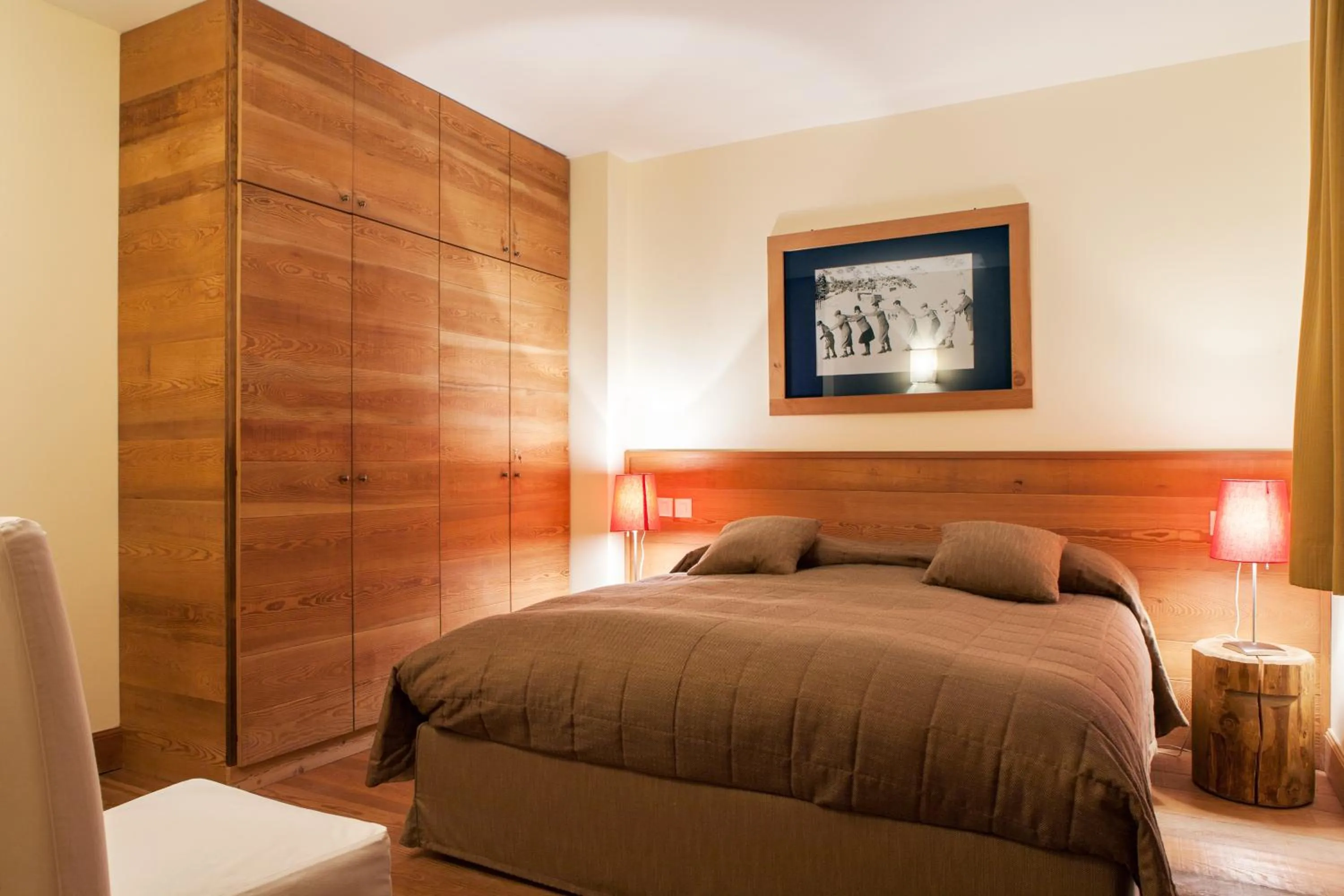 Bed in Maloja Palace Suites CO2-Neutral