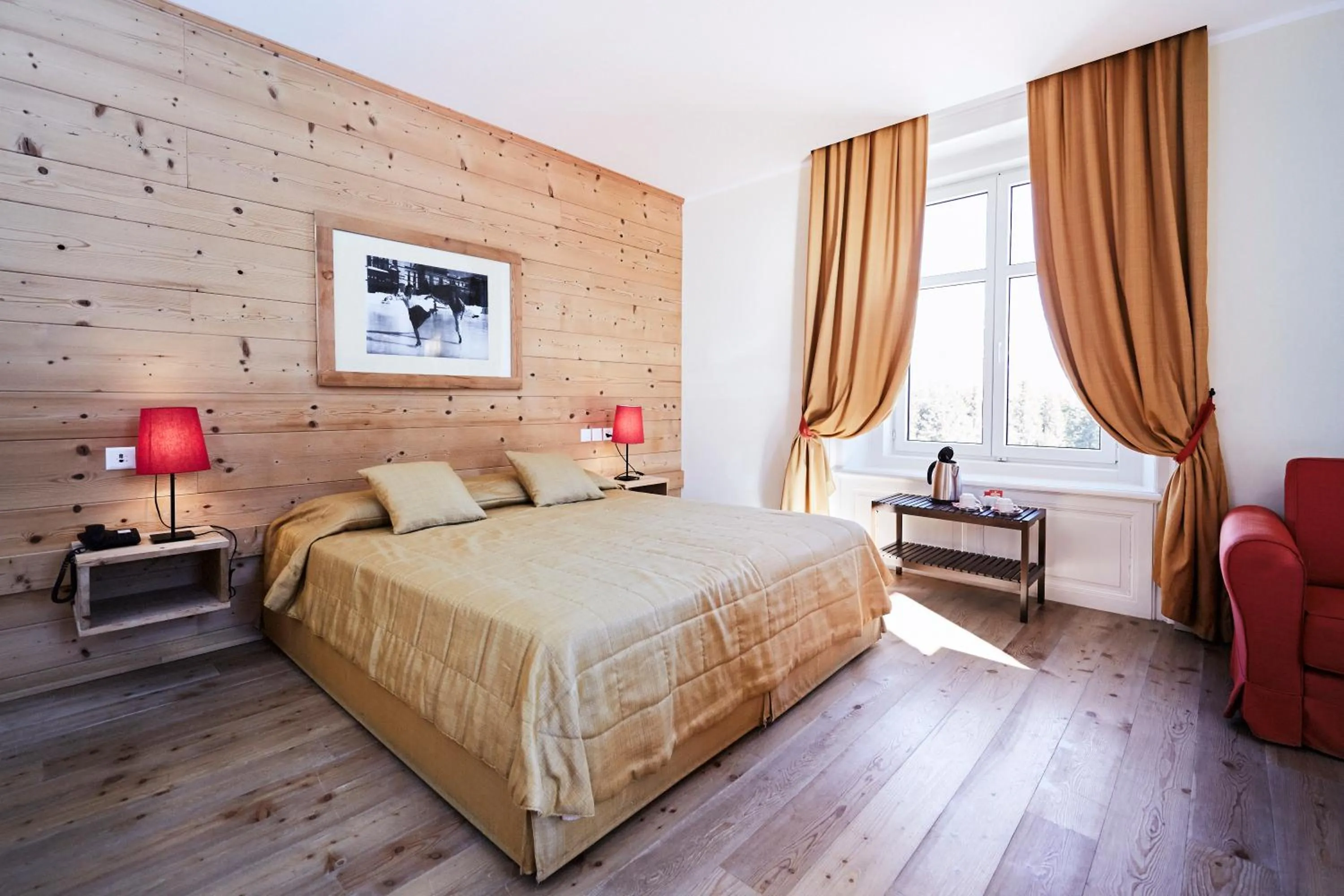 Bed in Maloja Palace Suites CO2-Neutral