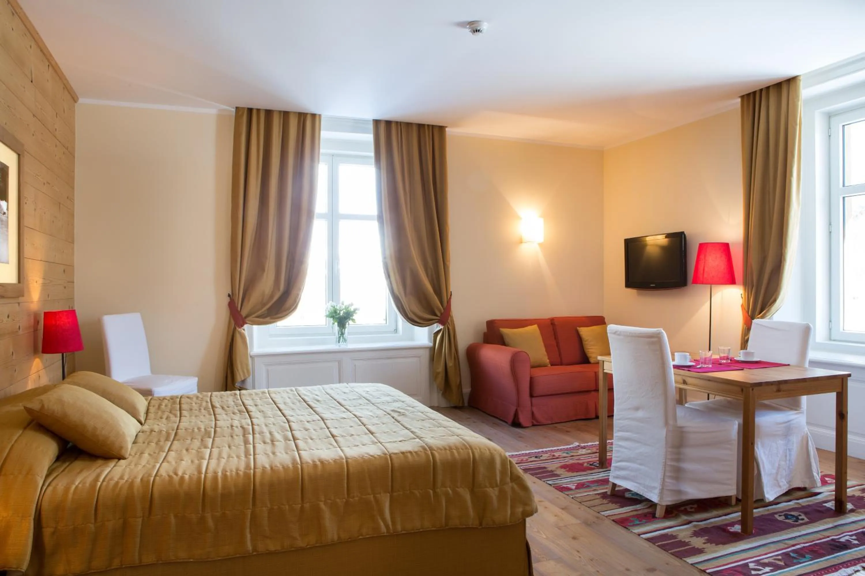 Bed in Maloja Palace Suites CO2-Neutral