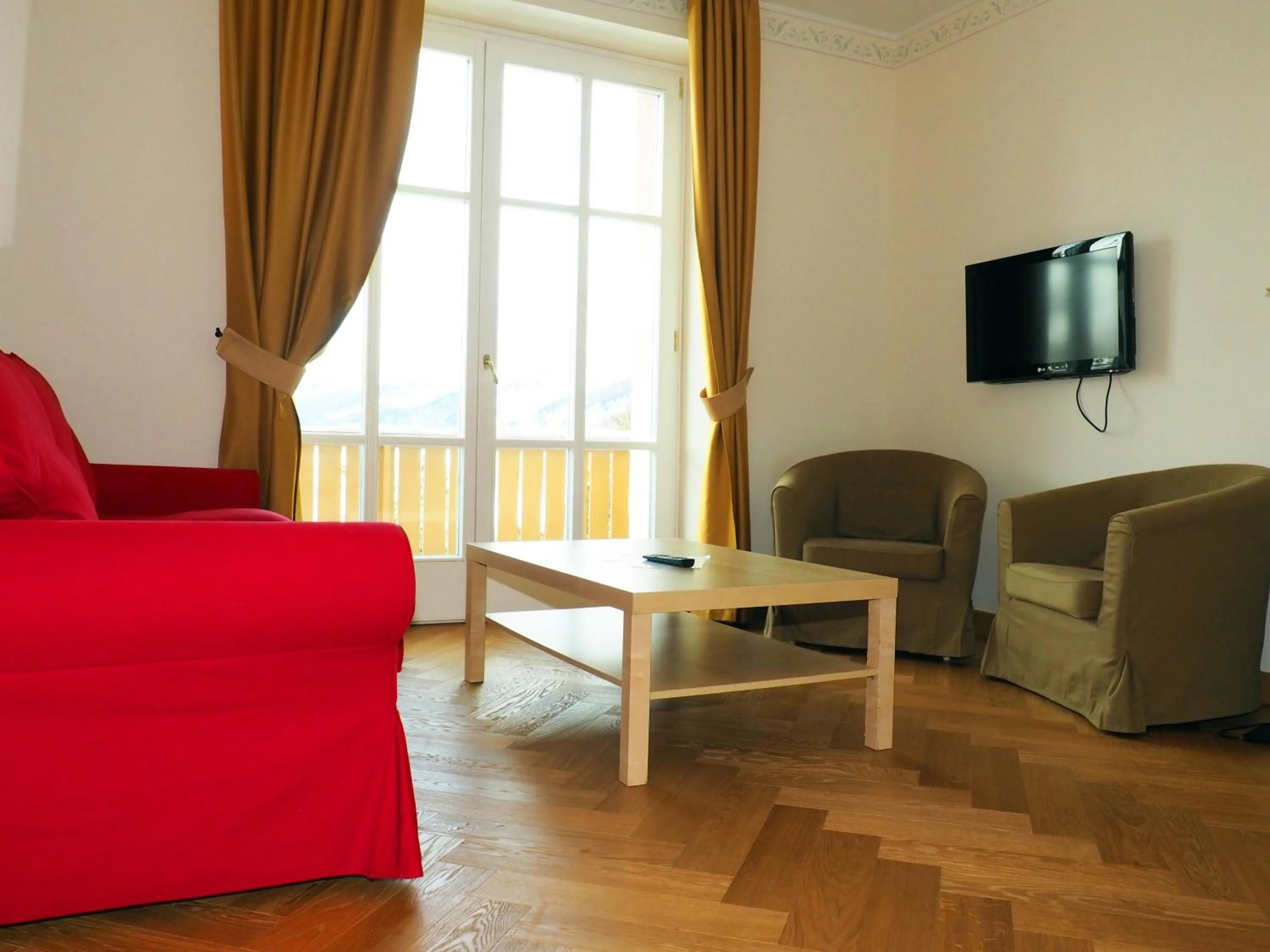 Living room in Maloja Palace Suites CO2-Neutral