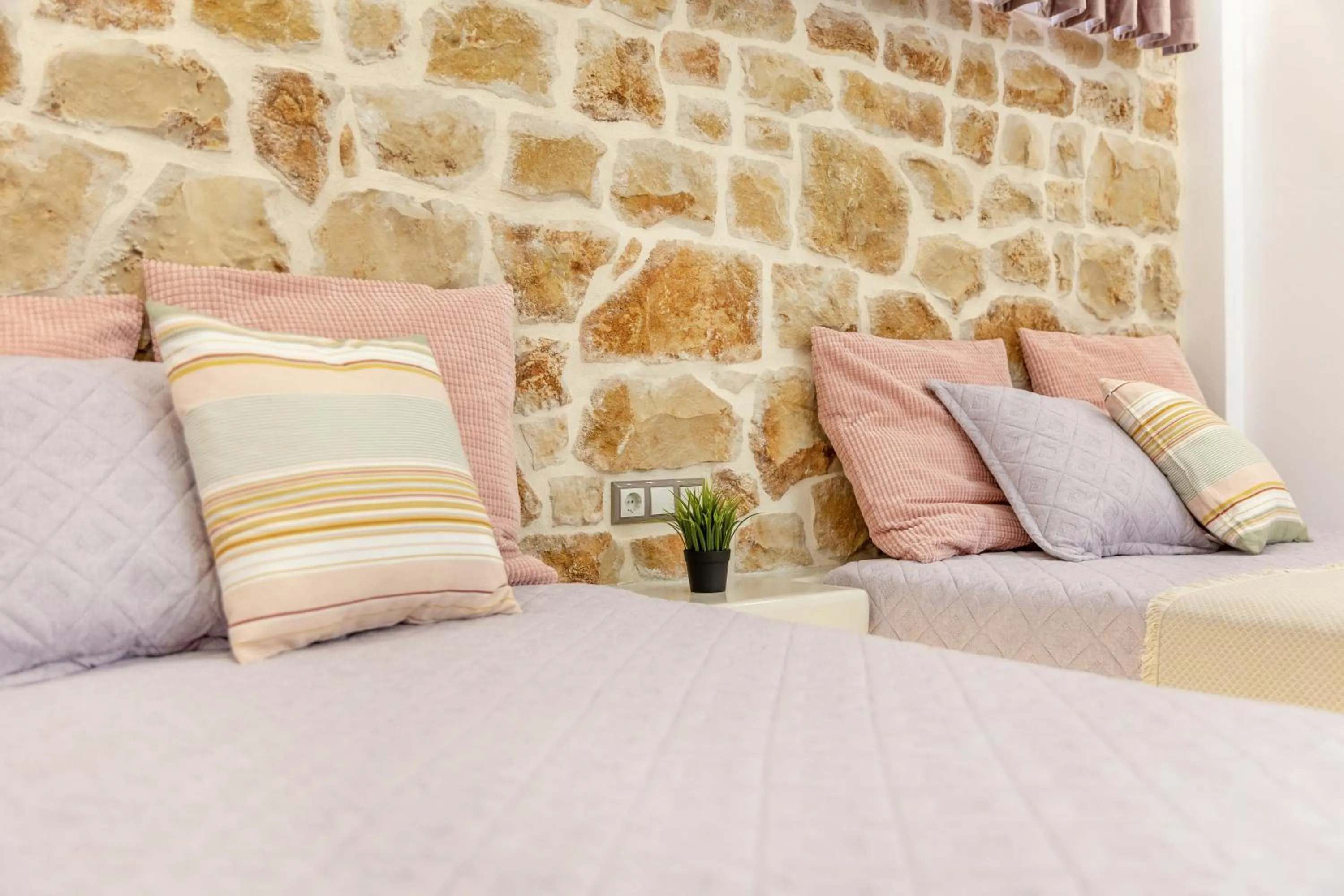 Bed in Katerina Roza Studios - Heartfelt Hospitality in the City