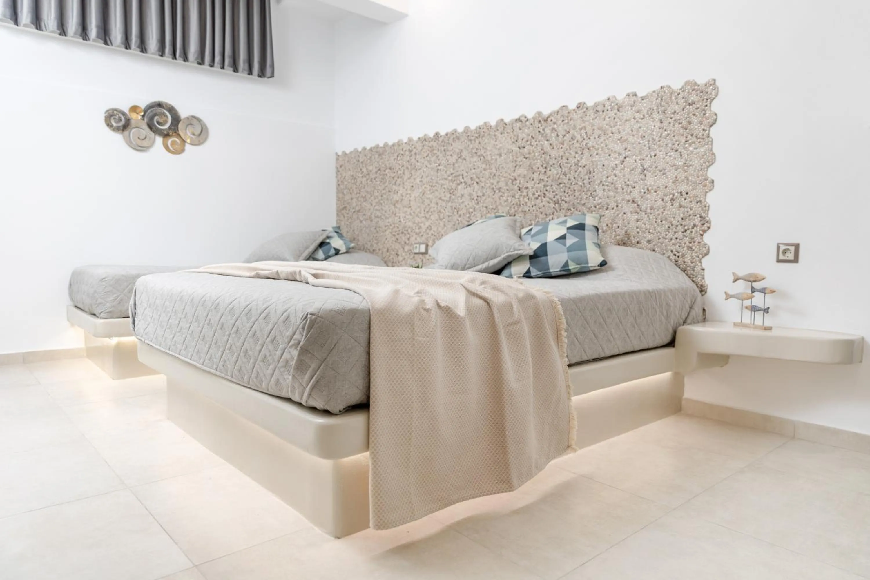 Bed in Katerina Roza Studios - Heartfelt Hospitality in the City