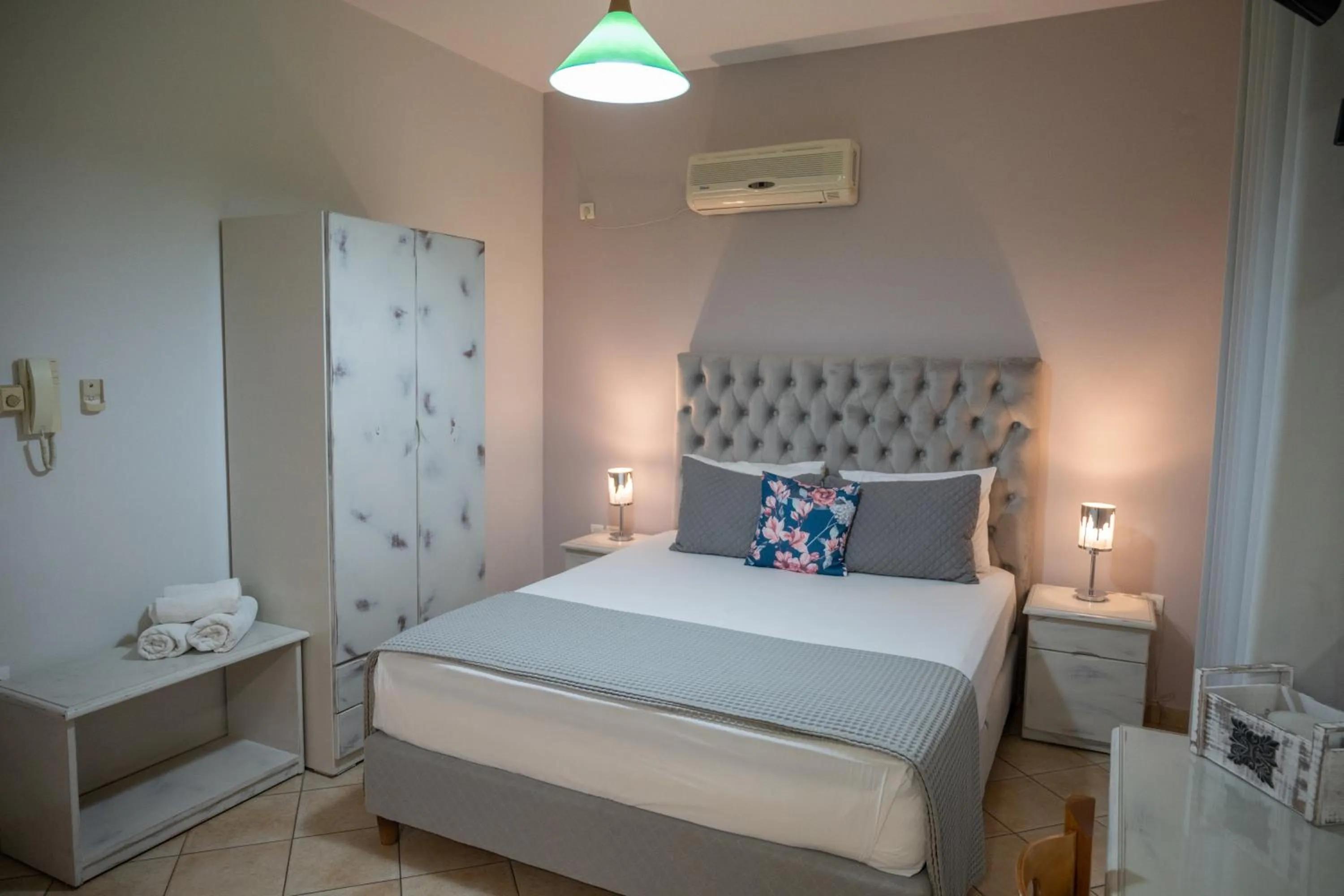 Bed in Katerina Roza Studios - Heartfelt Hospitality in the City