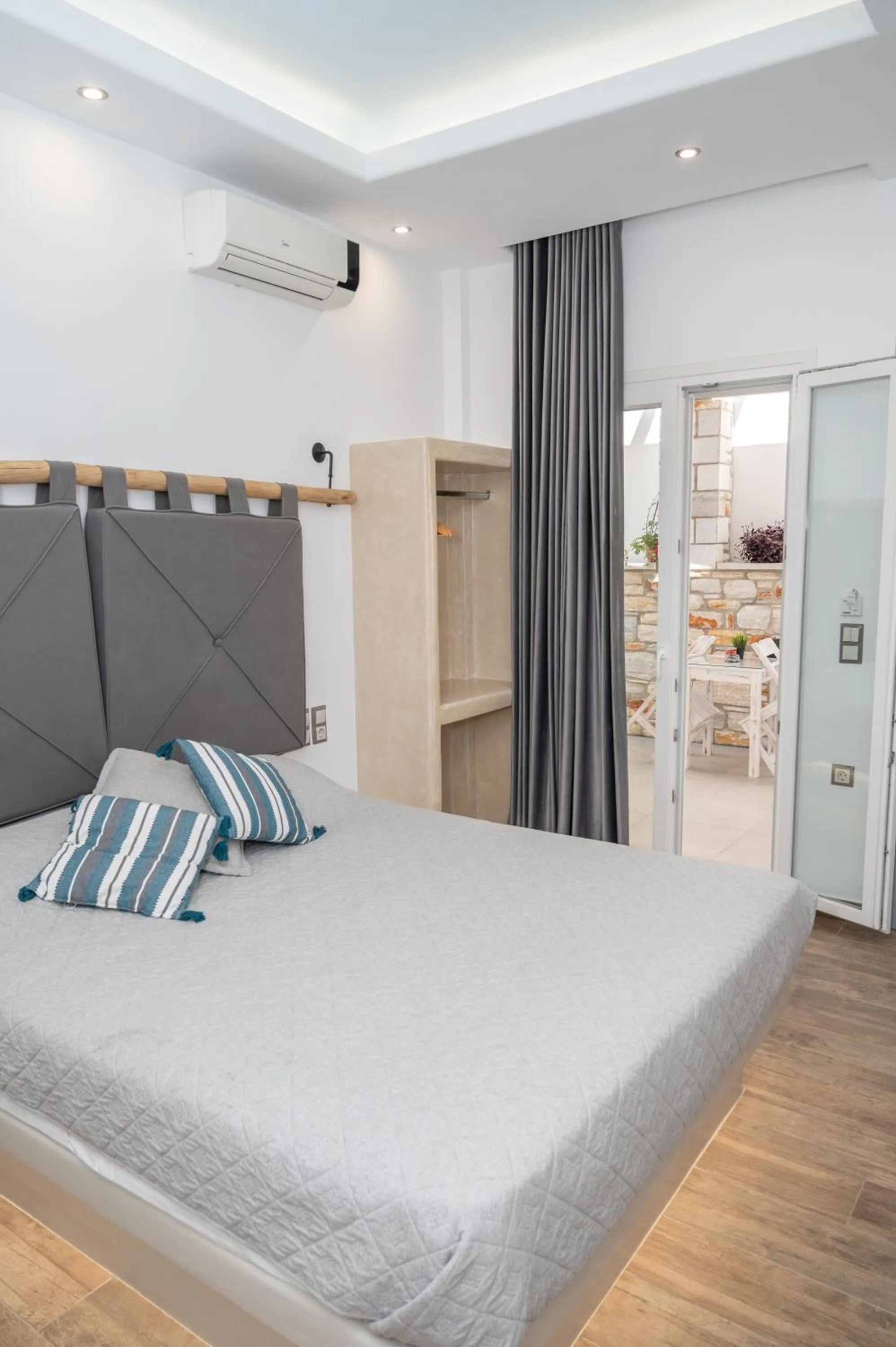 Bed in Katerina Roza Studios - Heartfelt Hospitality in the City