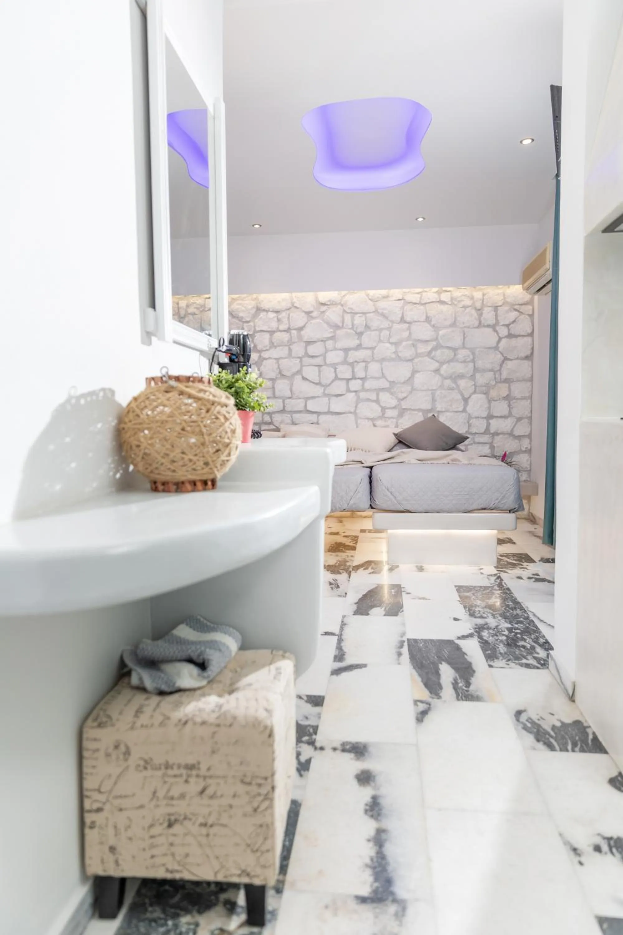 Bed in Katerina Roza Studios - Heartfelt Hospitality in the City