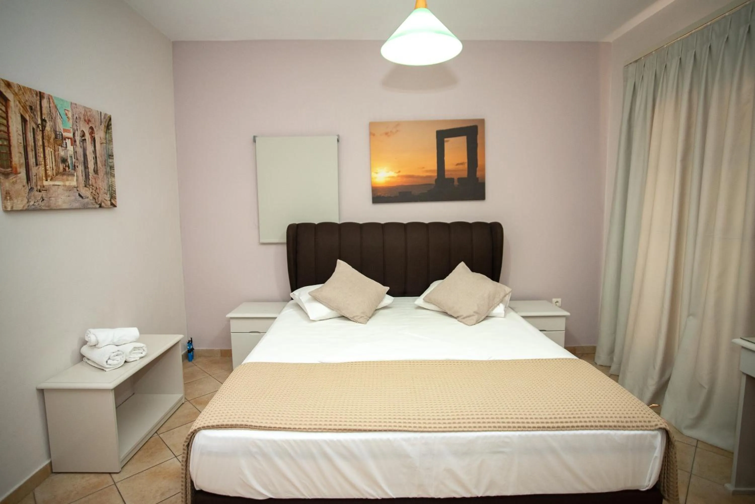 Bed in Katerina Roza Studios - Heartfelt Hospitality in the City
