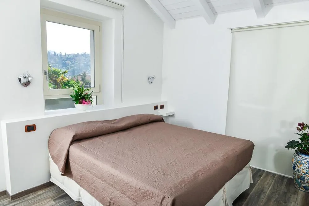 Bed in Albergo Silvio