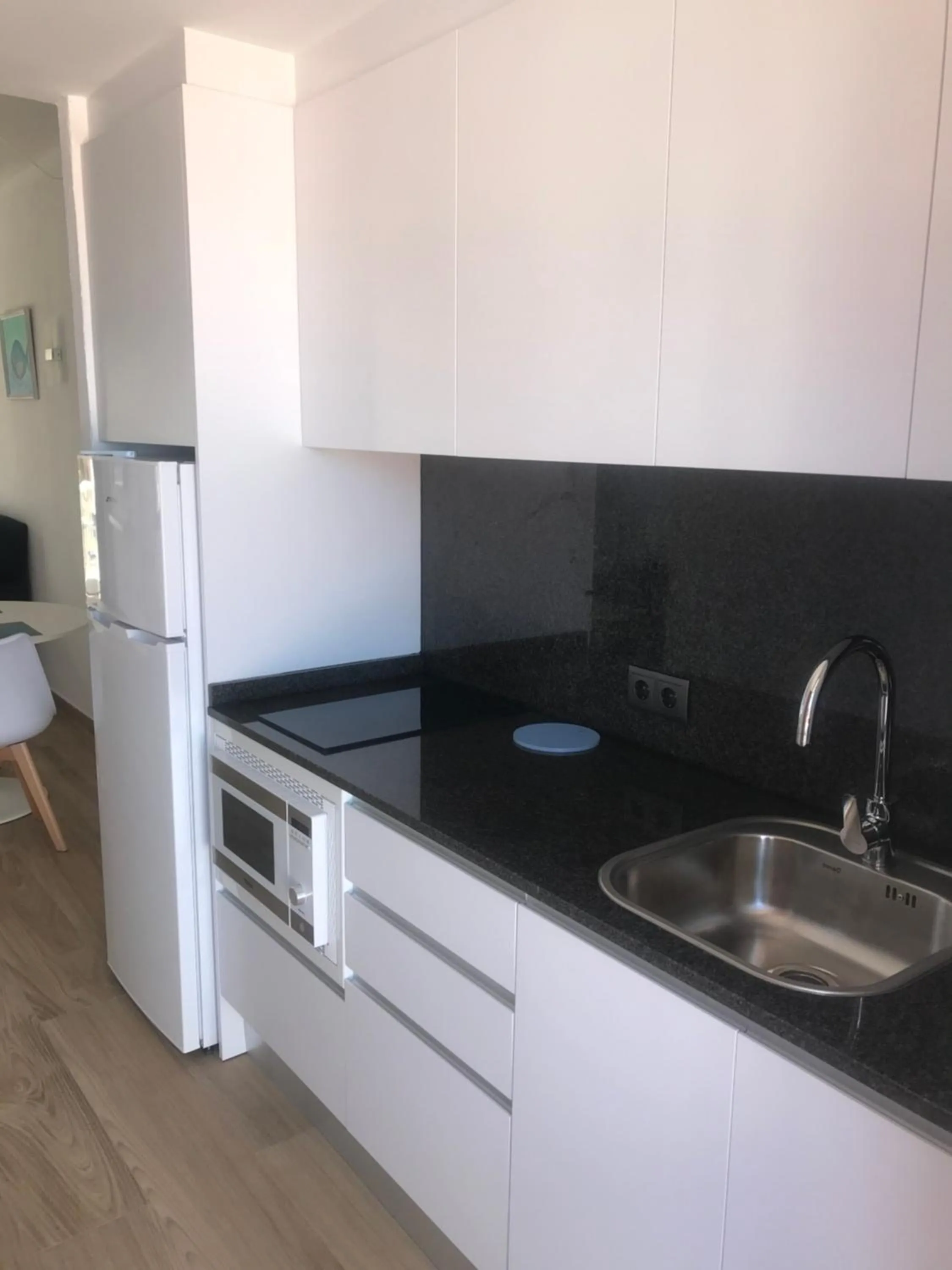 Kitchen or kitchenette in Apartamentos El Bergantin Menorca Club