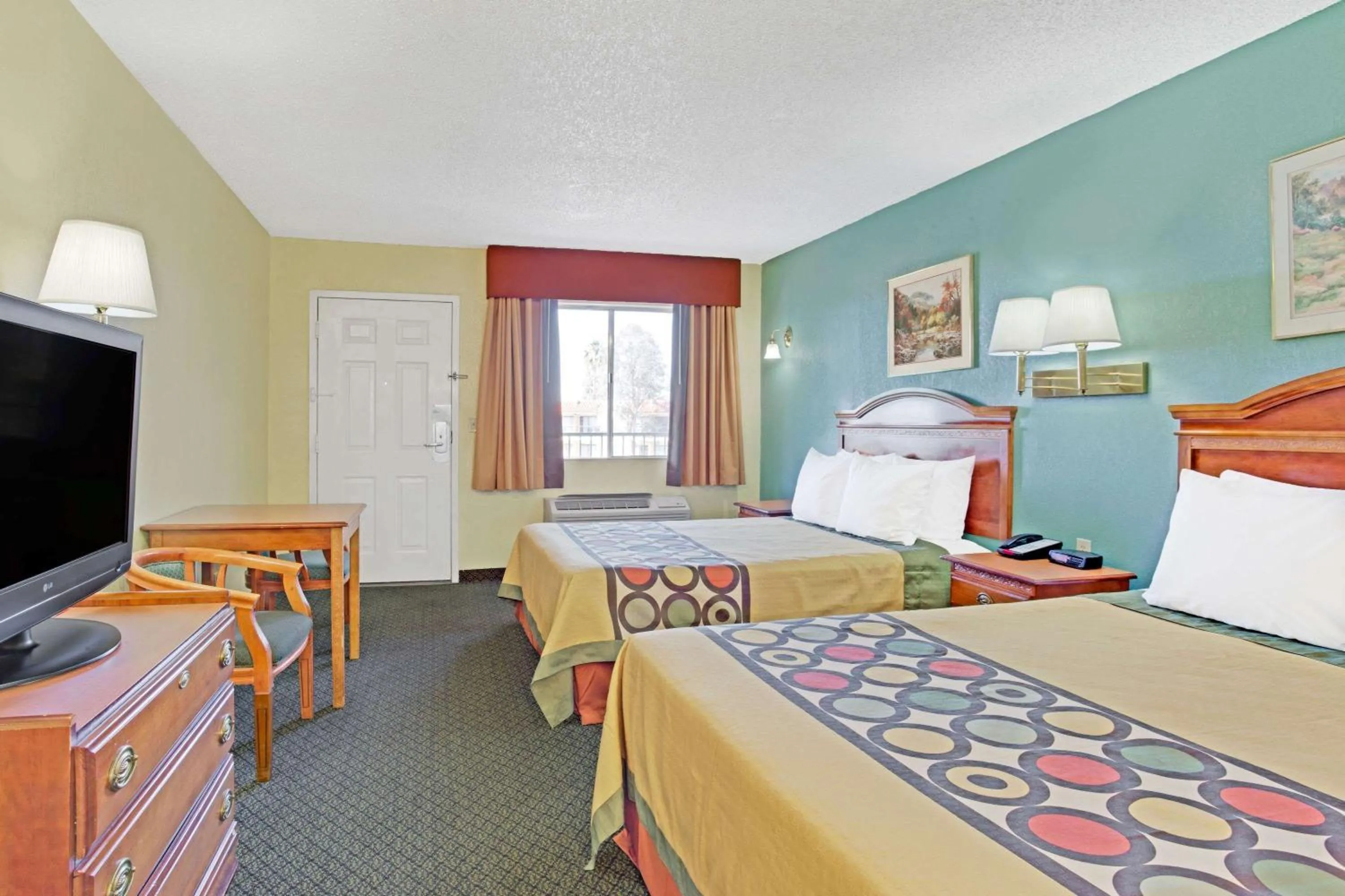 Photo of the whole room, Bed in Super 8 by Wyndham Tucson Downtown Convention Center