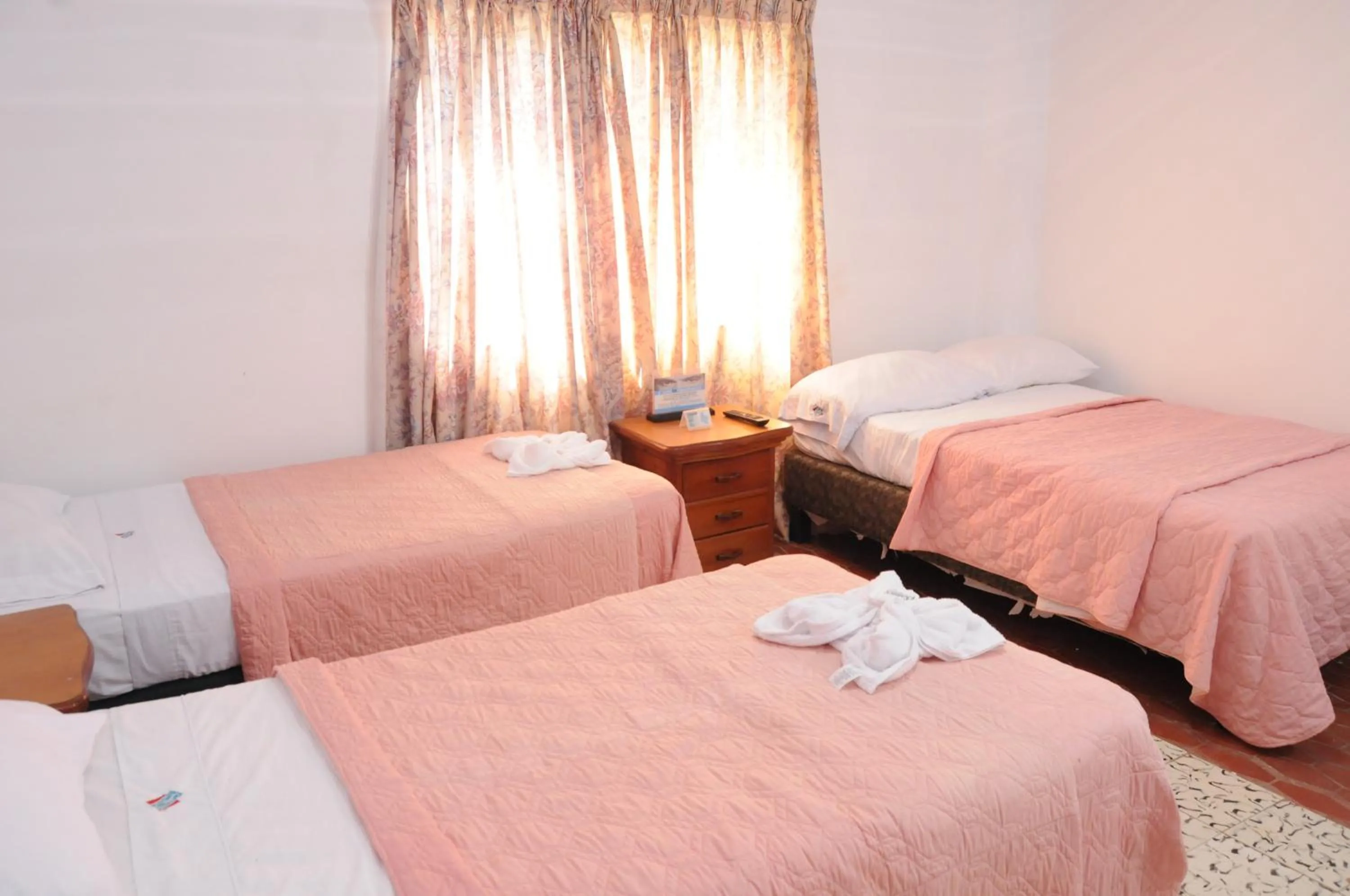 Bed in Hotel Montecarlo Beach