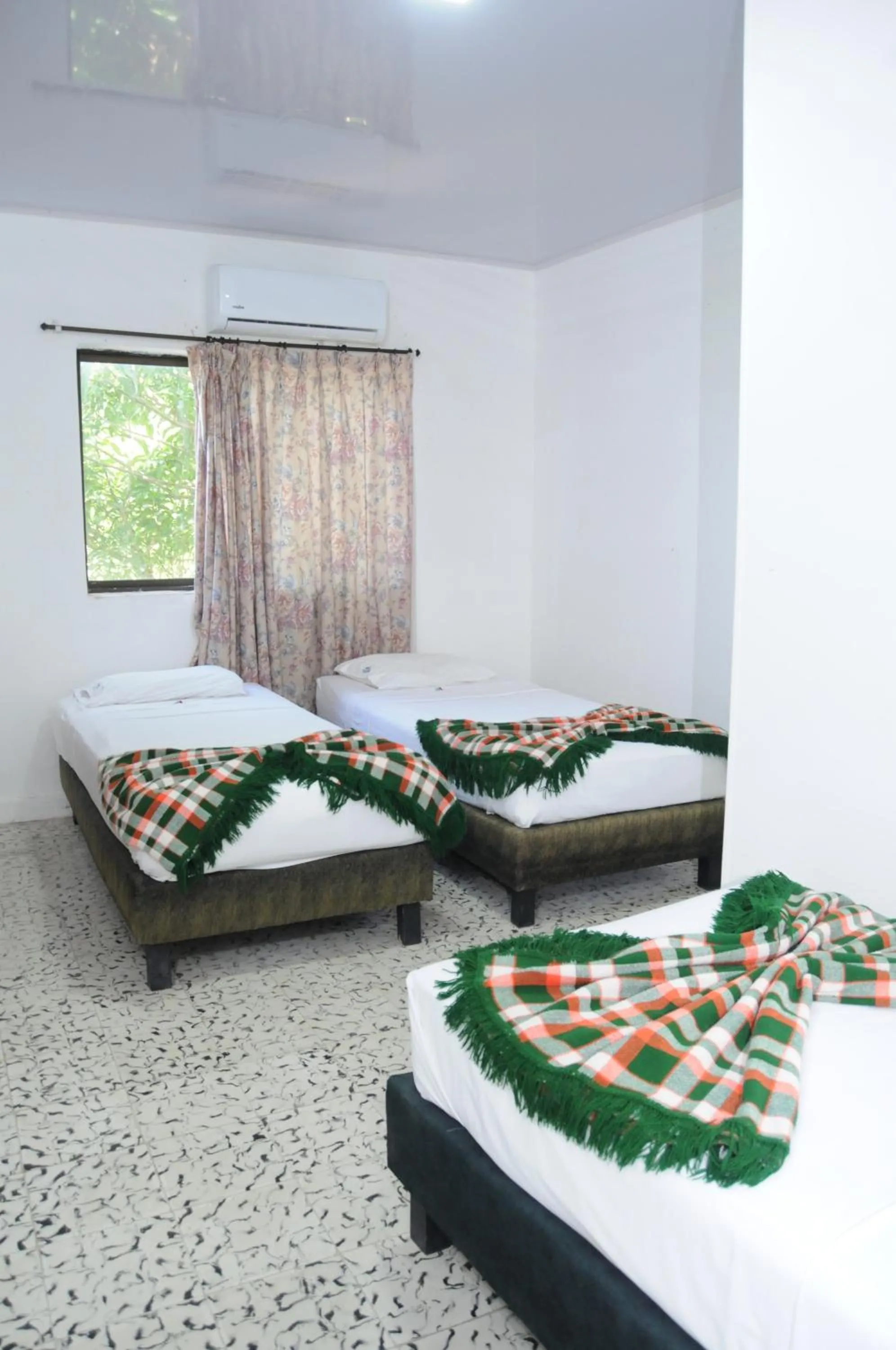 Bed in Hotel Montecarlo Beach