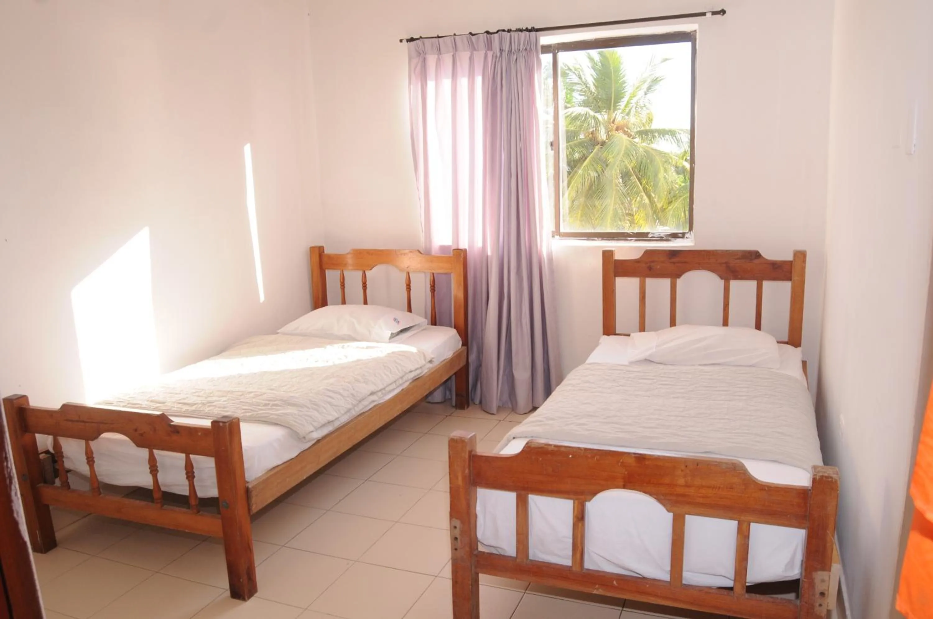 Bed in Hotel Montecarlo Beach