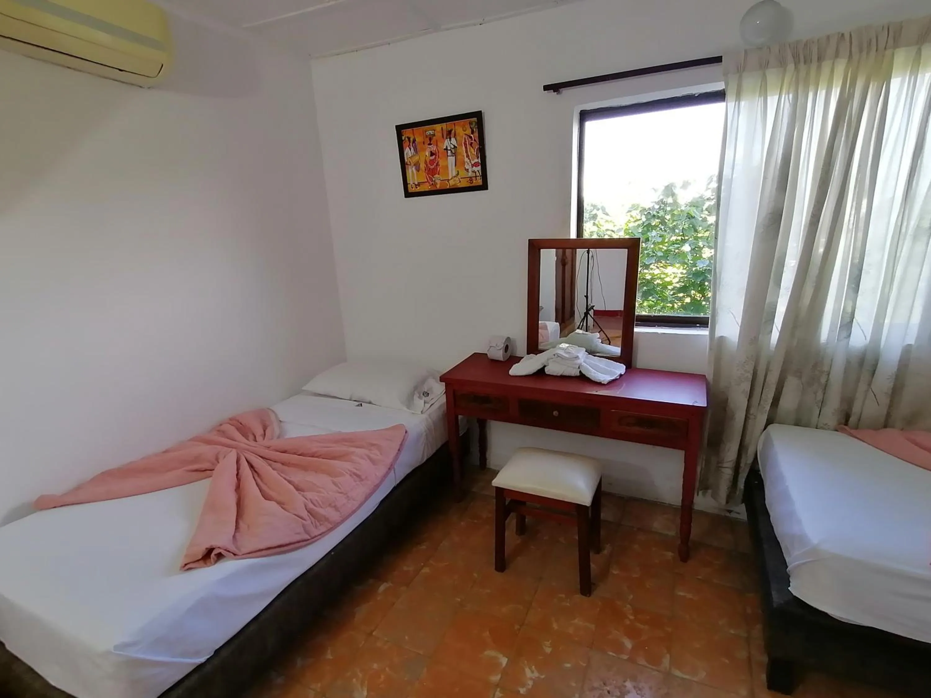 Bed in Hotel Montecarlo Beach