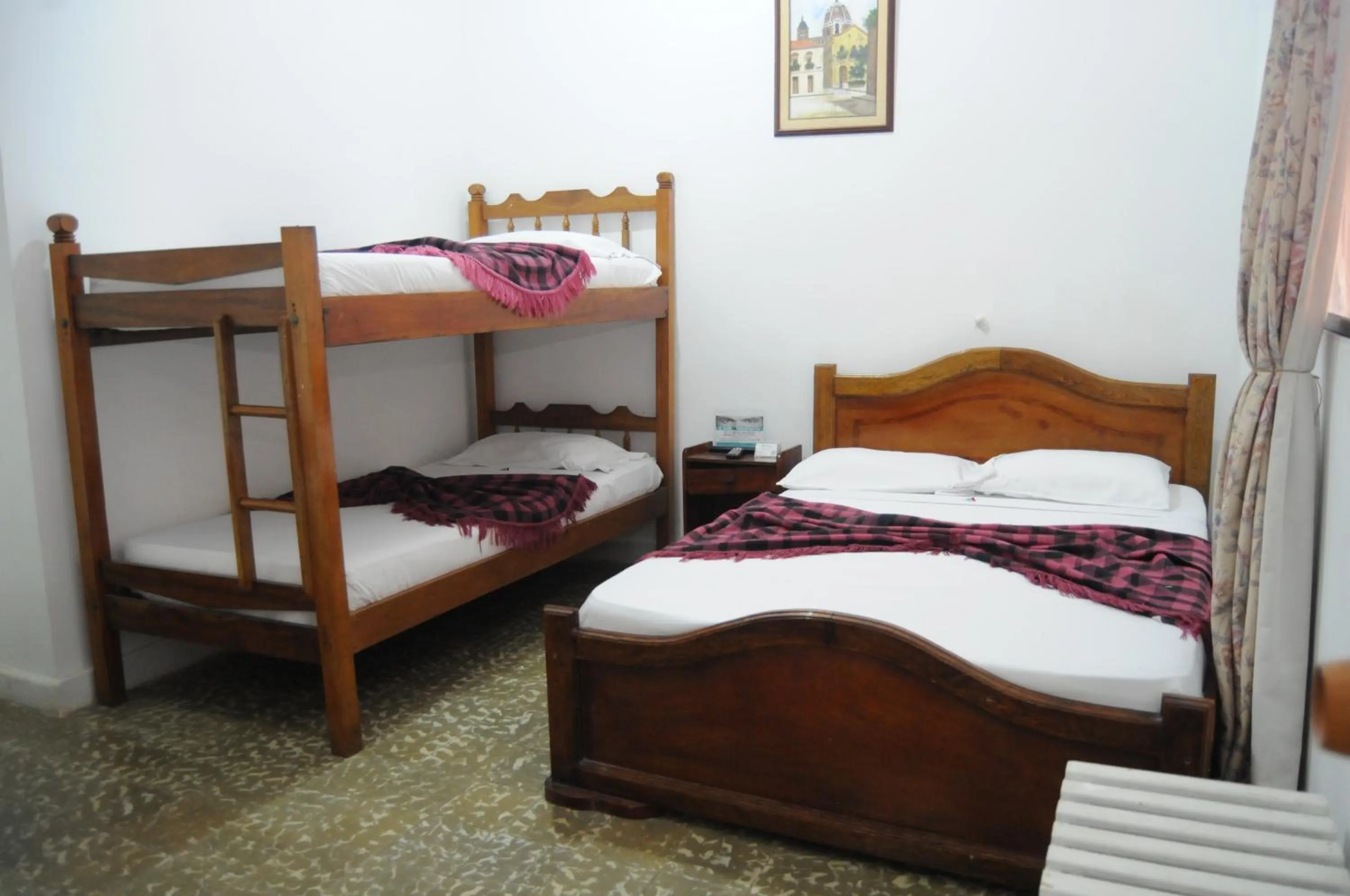 Bed in Hotel Montecarlo Beach