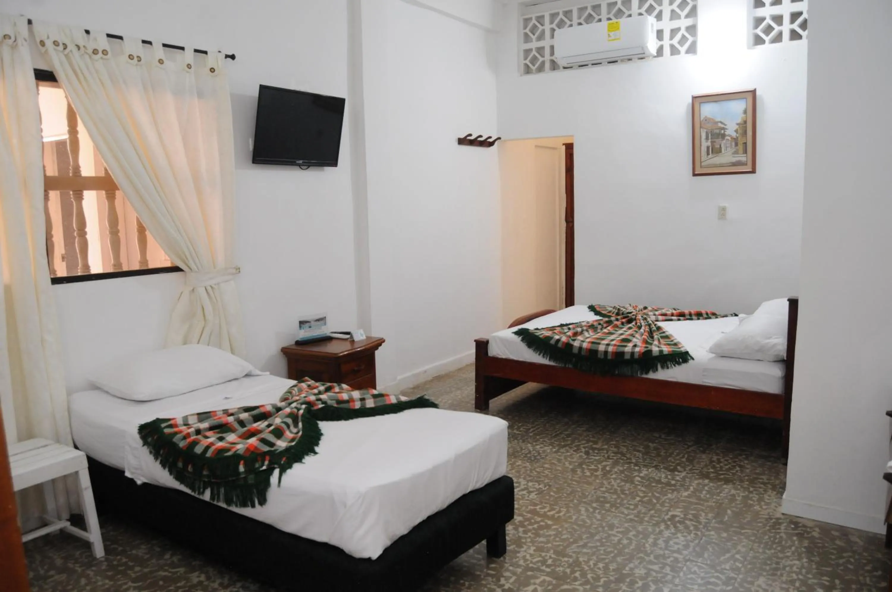 Bed in Hotel Montecarlo Beach