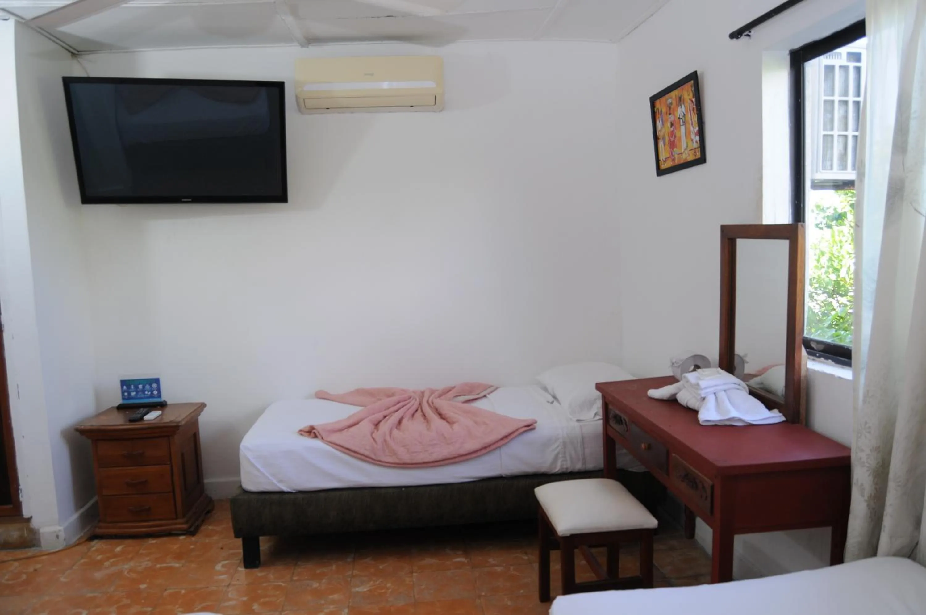 Bed in Hotel Montecarlo Beach