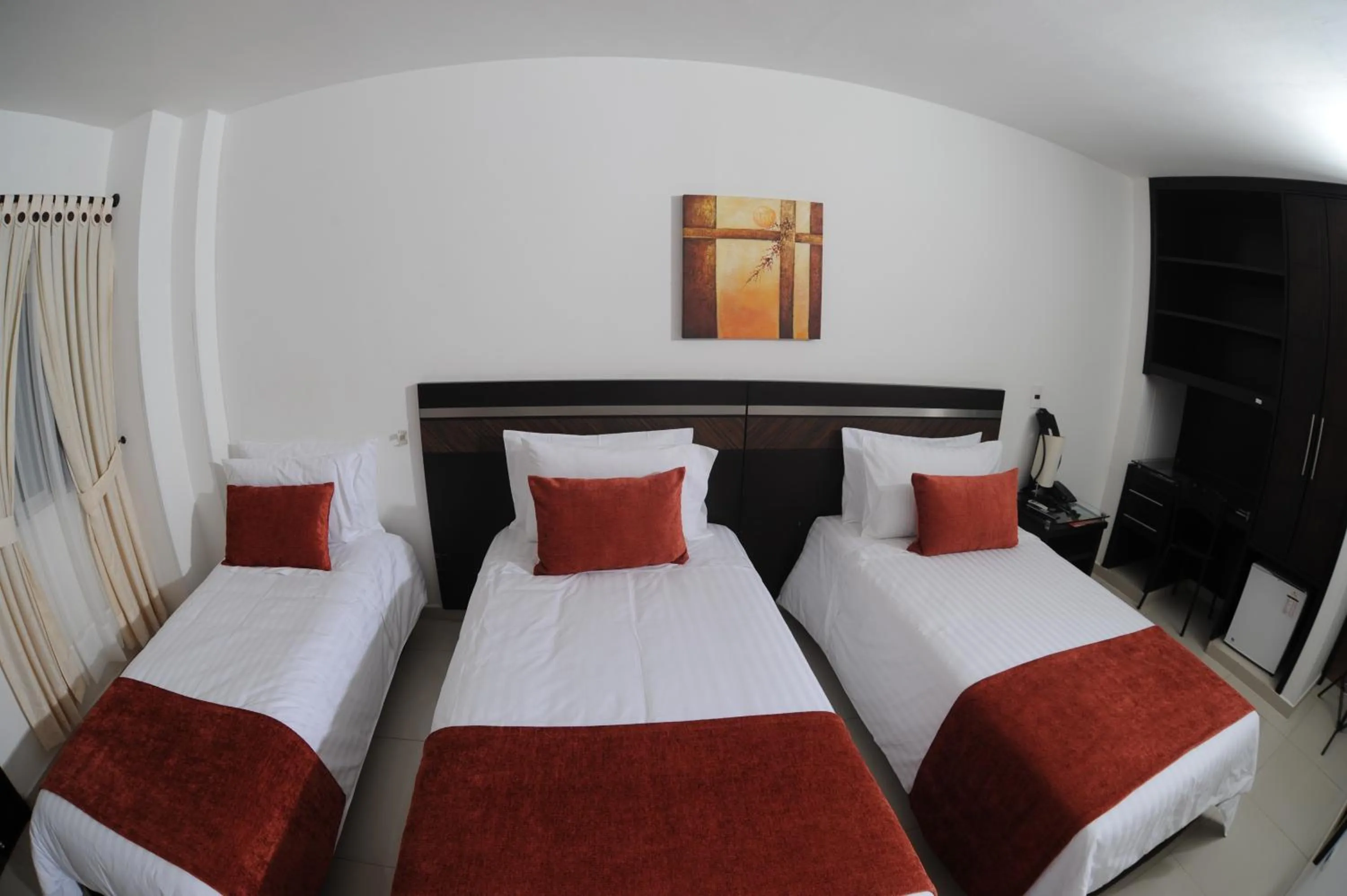 Bed in Hotel San José Plaza