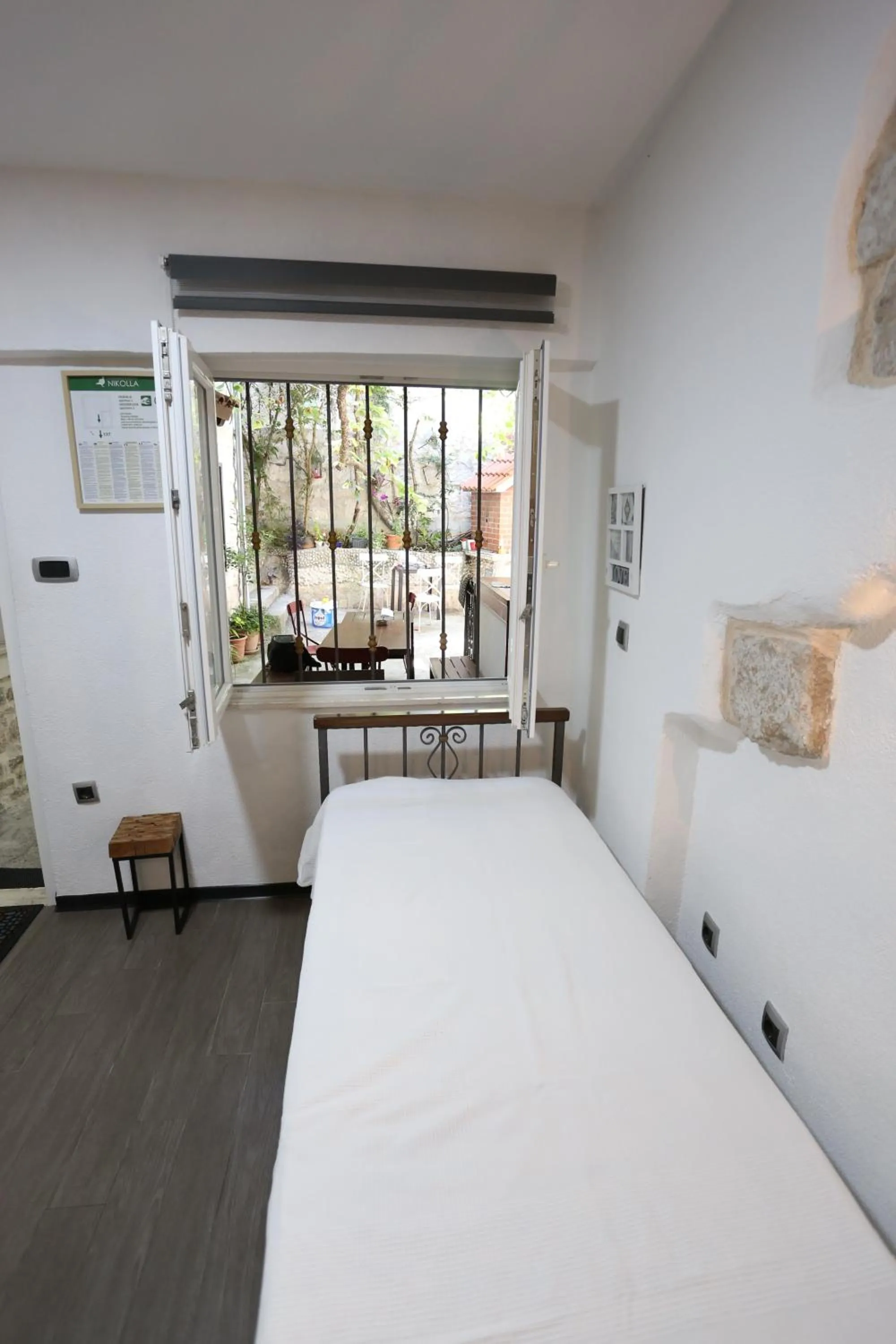 Bed in Apartments Nikolla