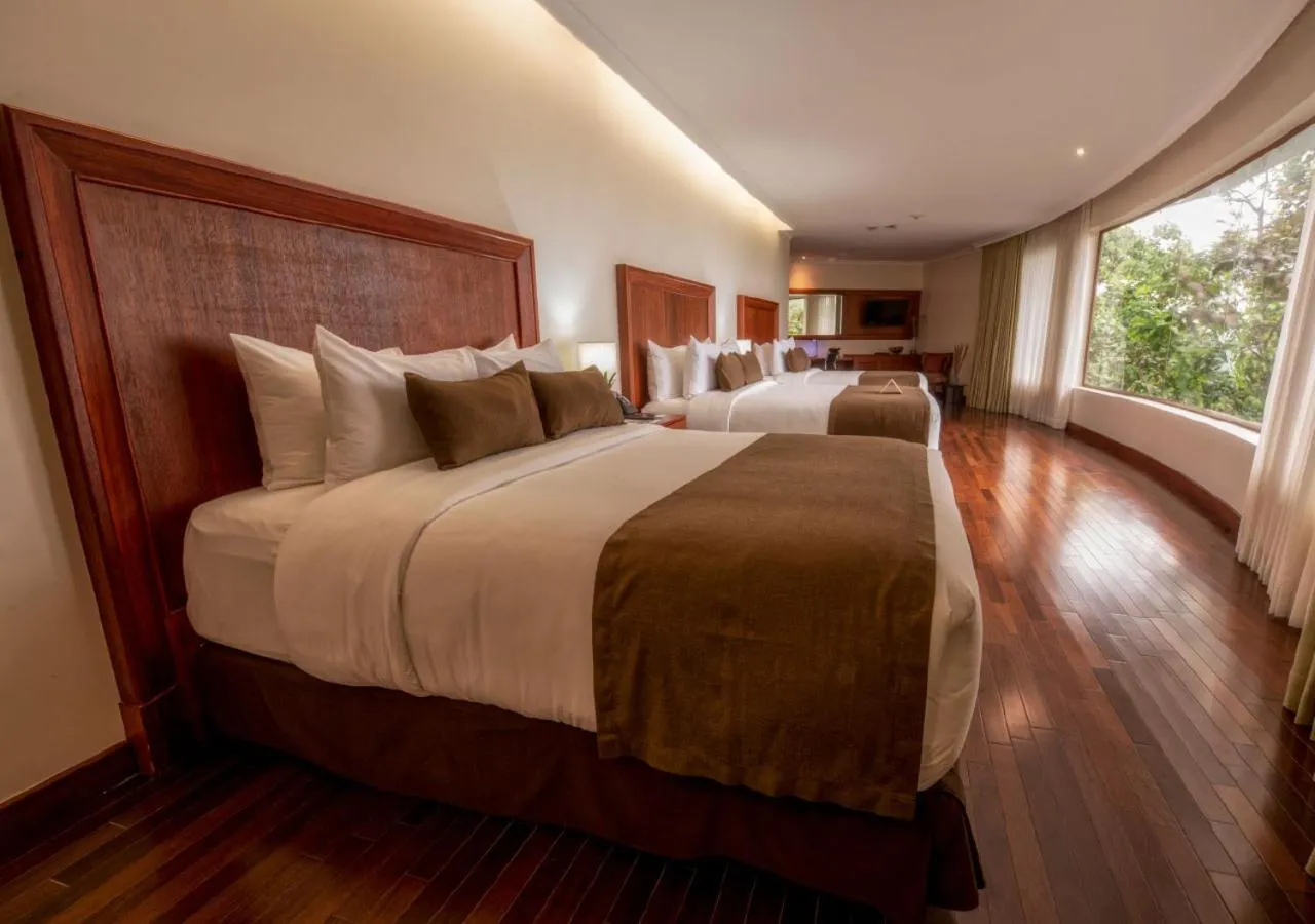 Photo of the whole room, Bed in Hillary Nature Resort & Spa All Inclusive