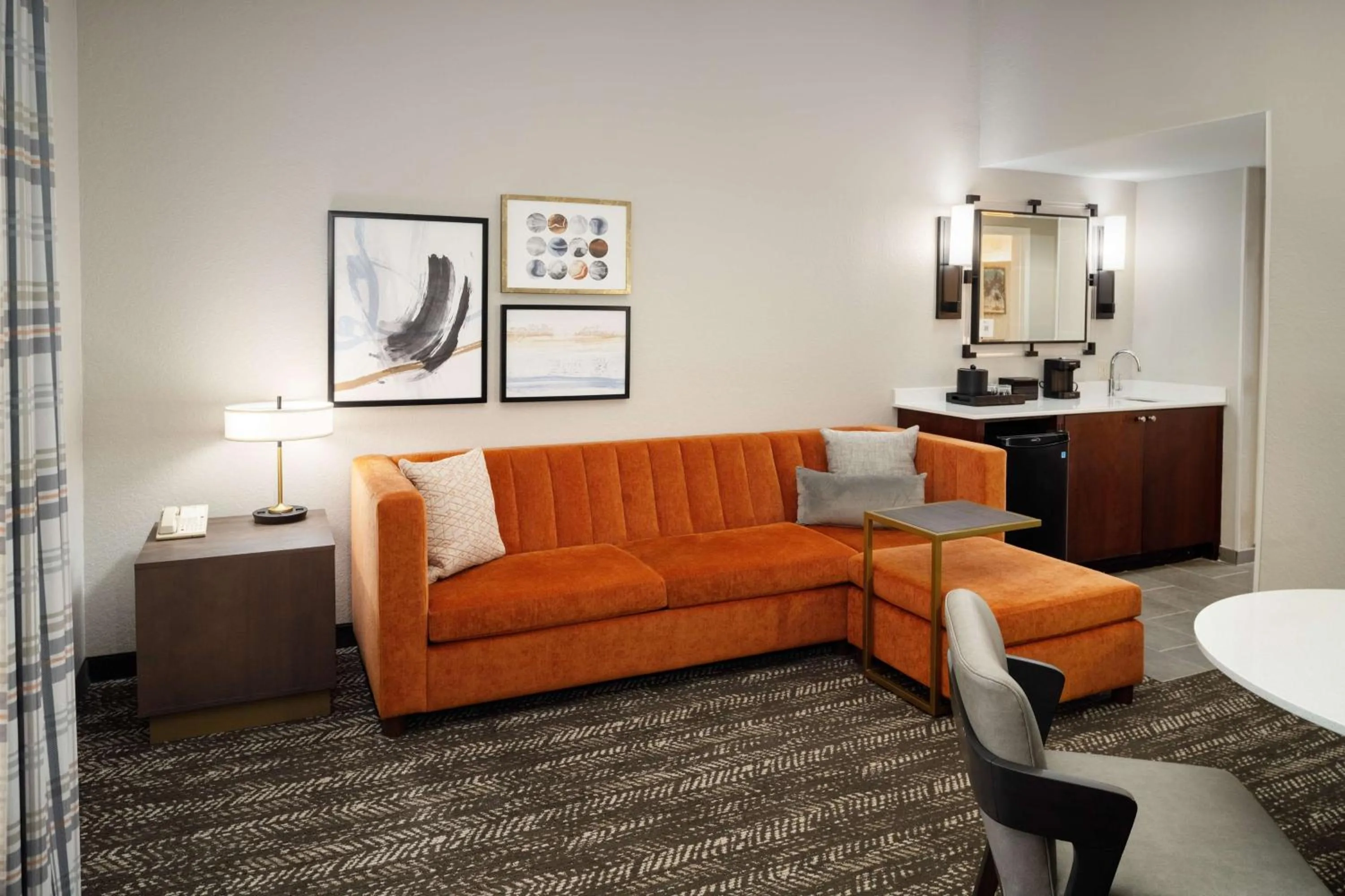 Living room in Embassy Suites by Hilton Orlando North