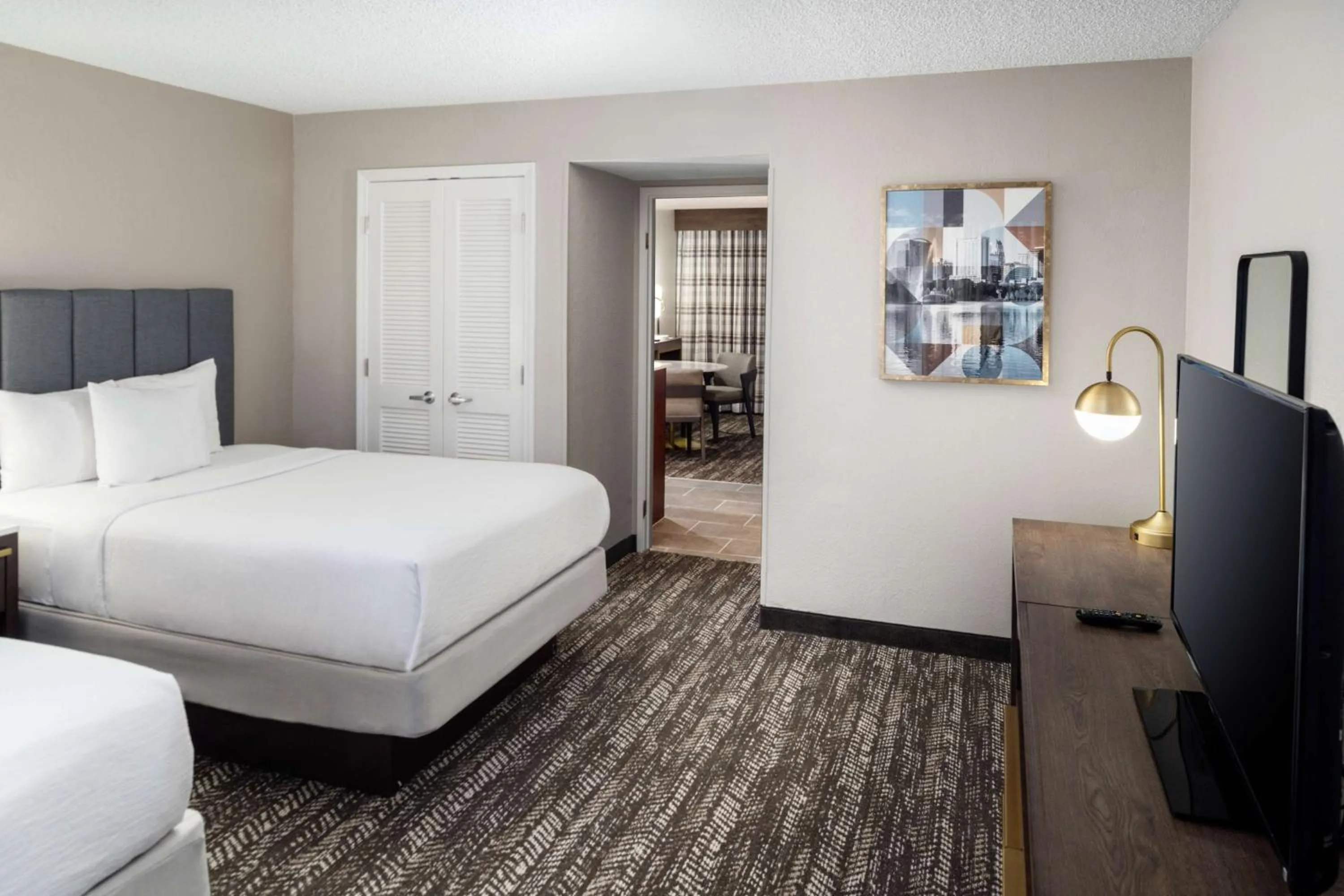 Bed in Embassy Suites by Hilton Orlando North