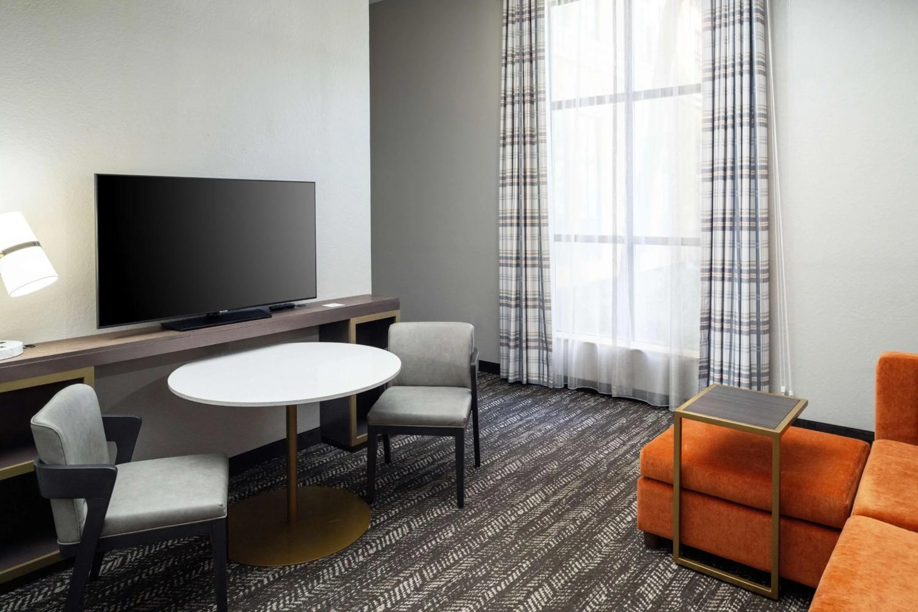 Living room in Embassy Suites by Hilton Orlando North