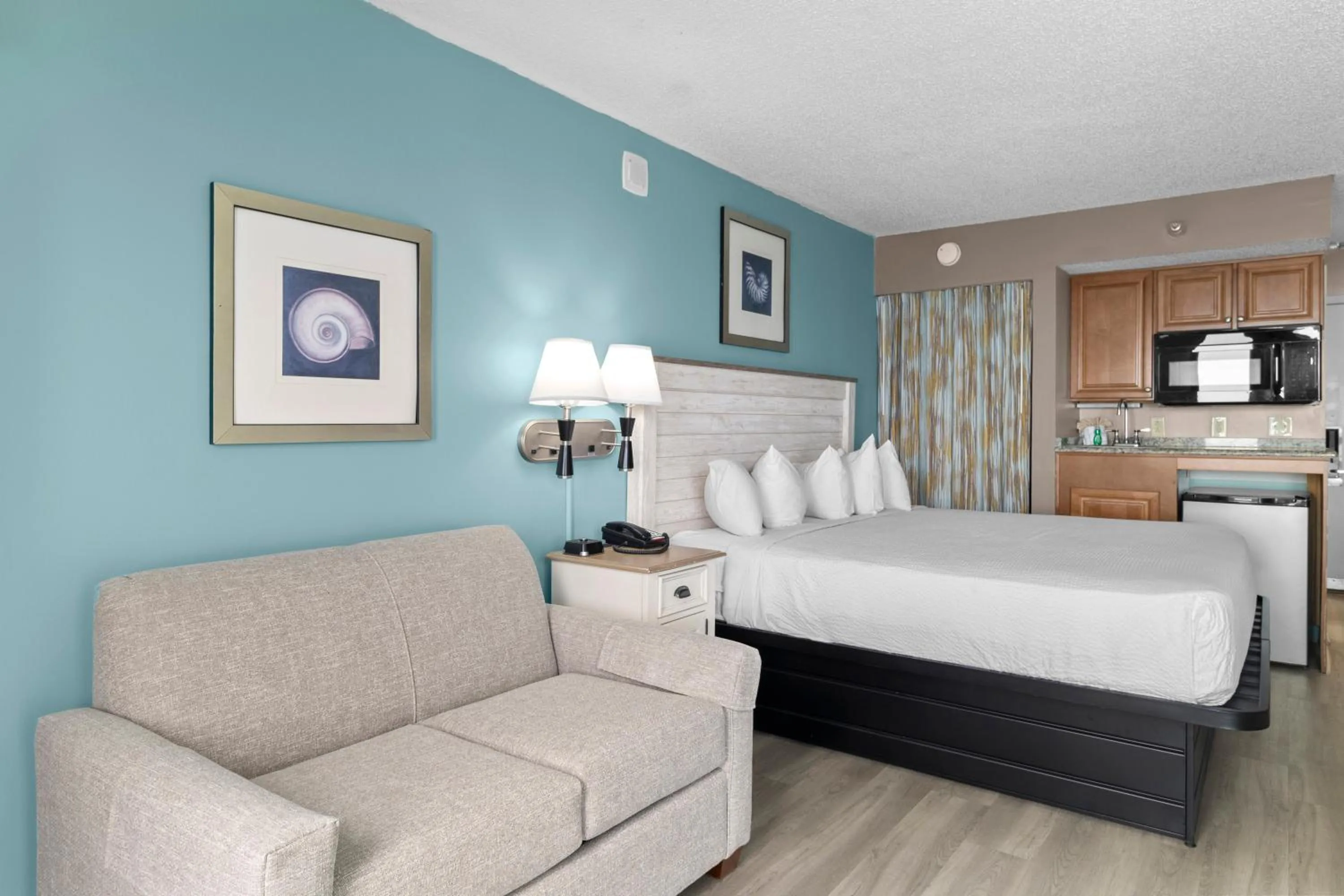 Bedroom, Bed in The Strand - A Boutique Resort