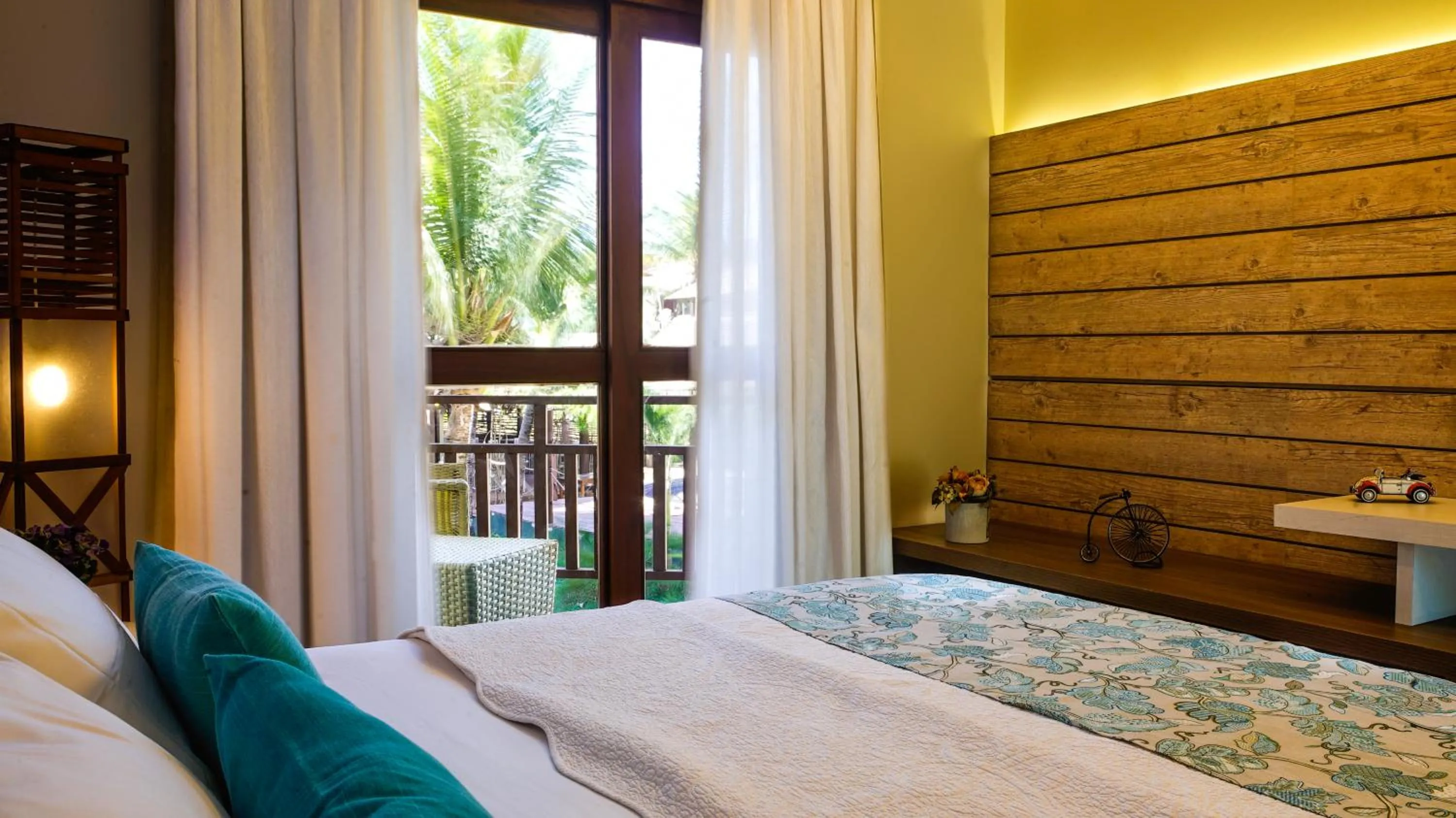 Bed in Kanaloa Pousada