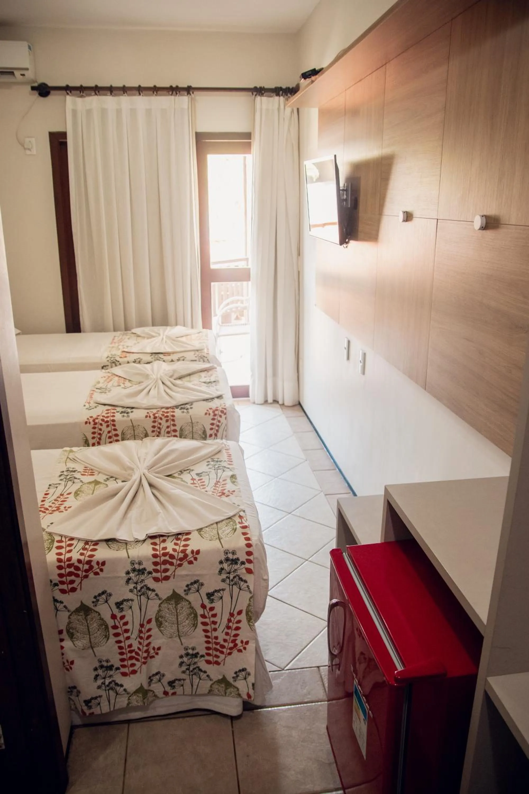 Bed in Kanaloa Pousada