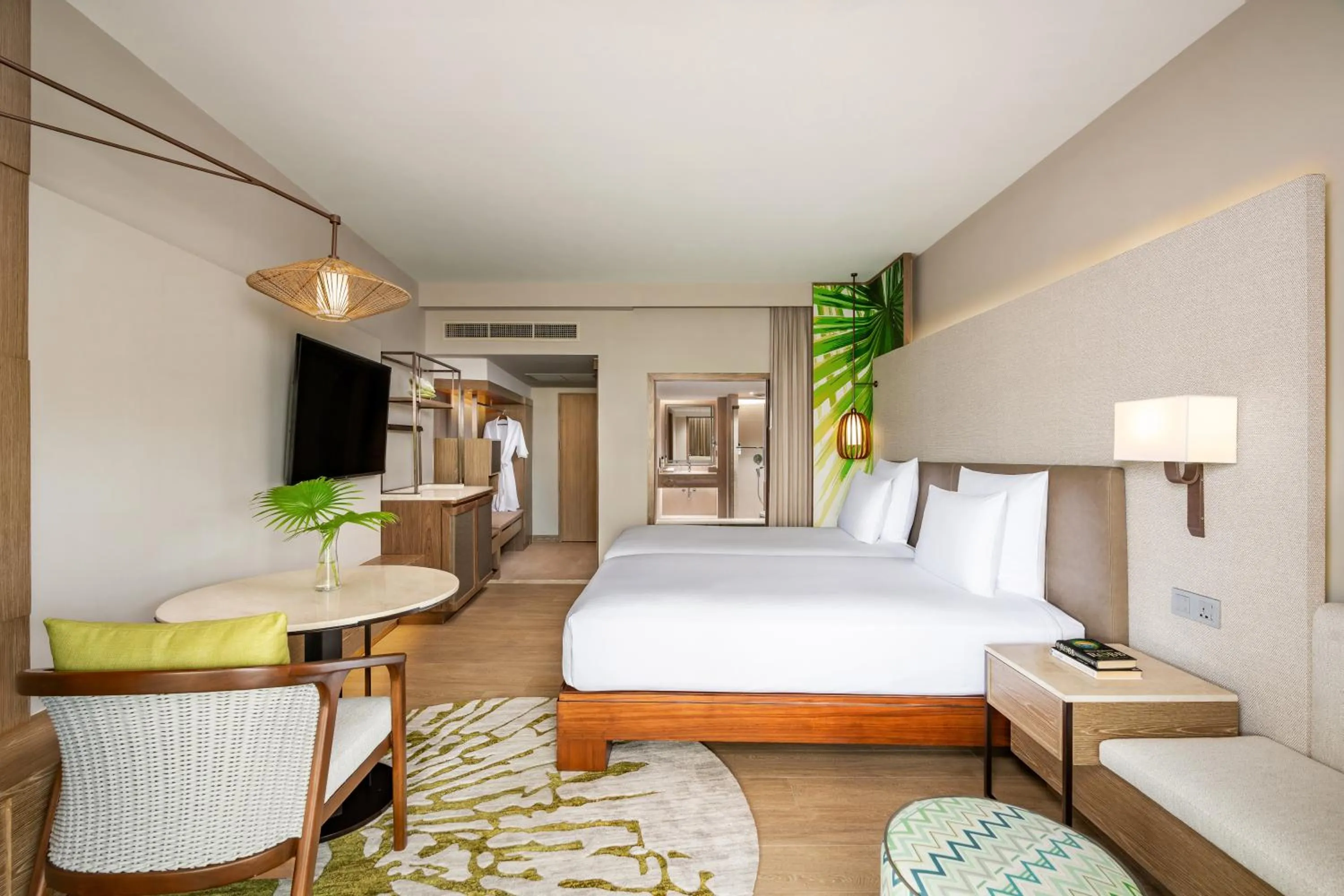 Bed in Pullman Phuket Karon Beach Resort