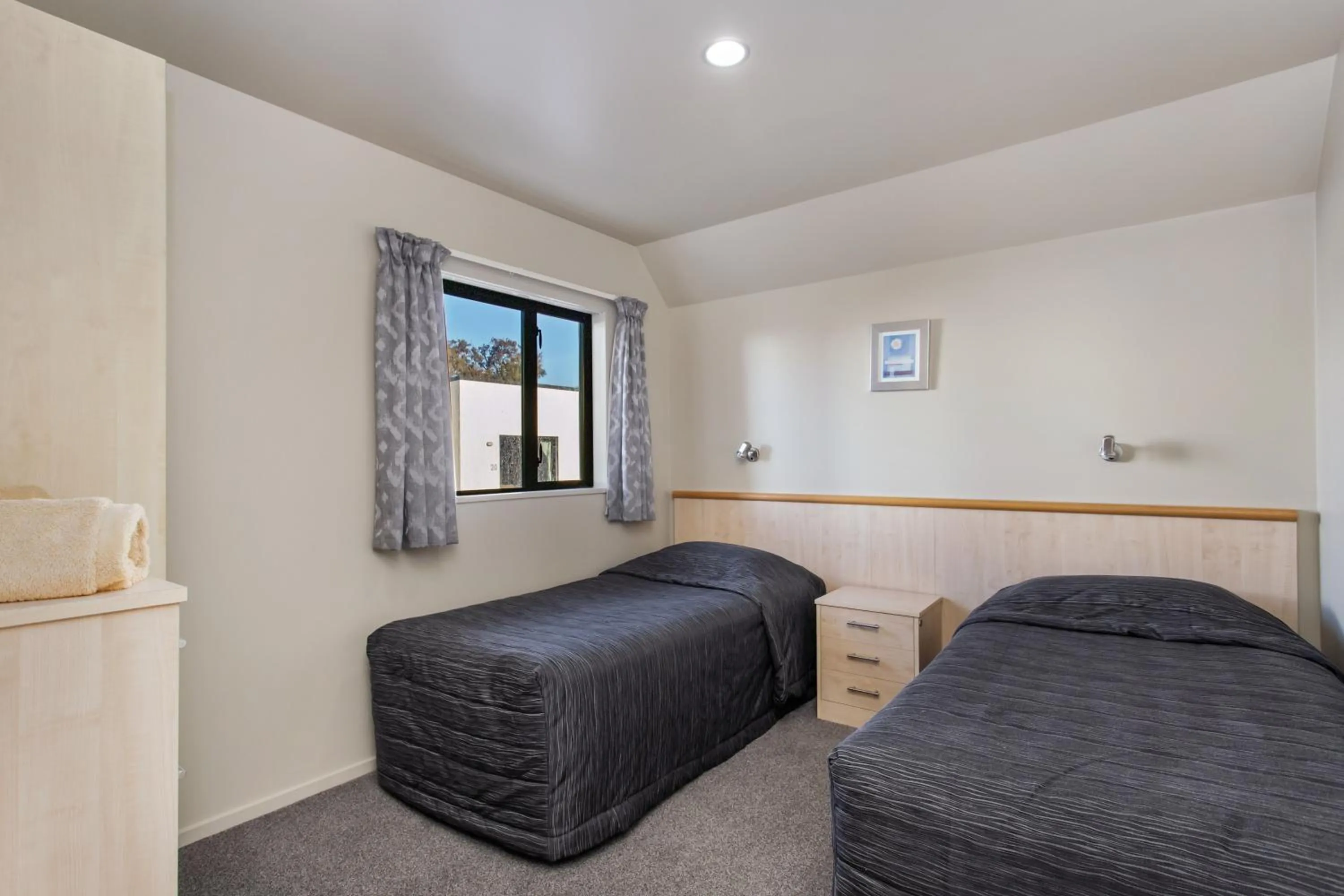 Bed in Kaikoura Gateway Motor Lodge