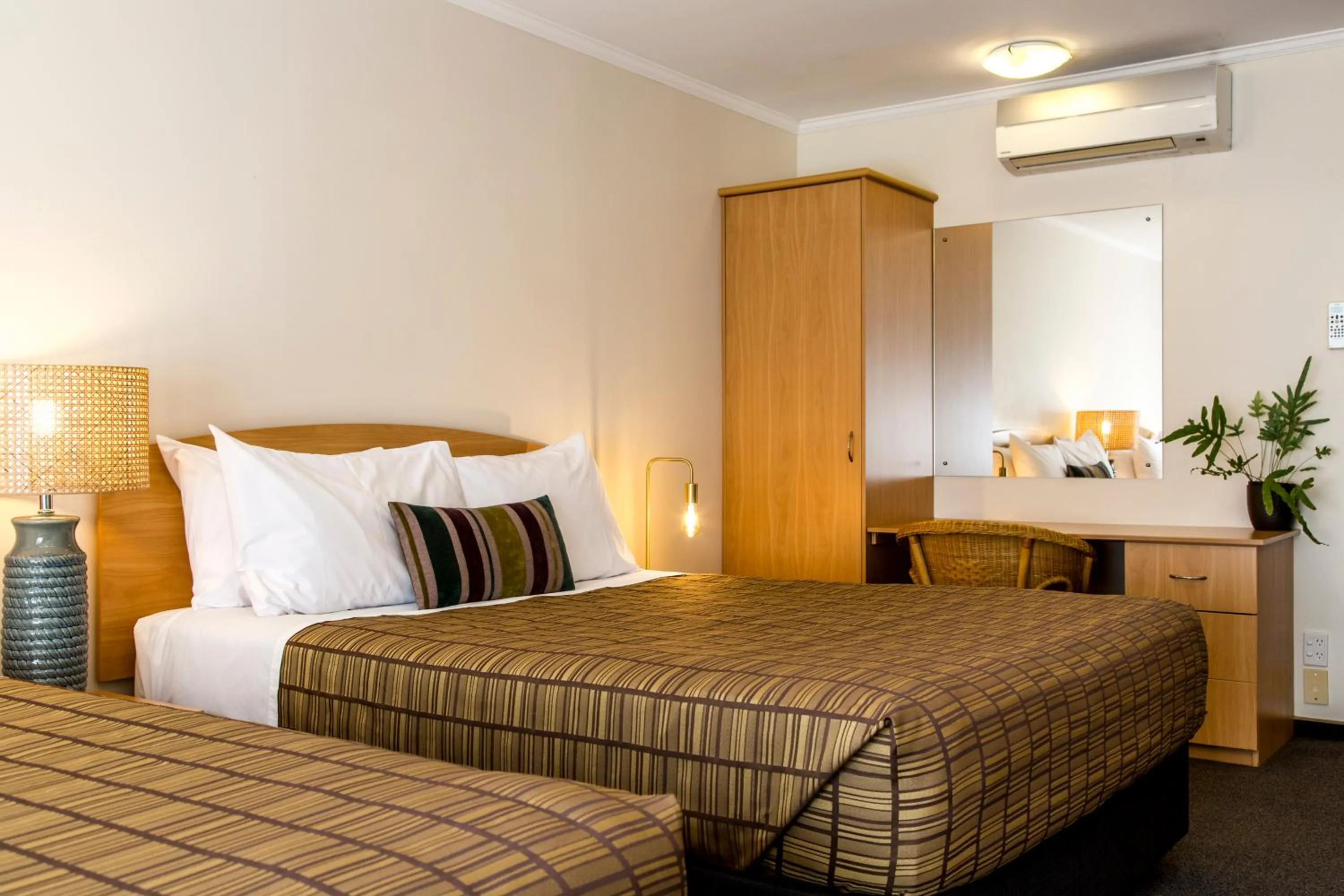 Bed in Greenlane Manor Motel