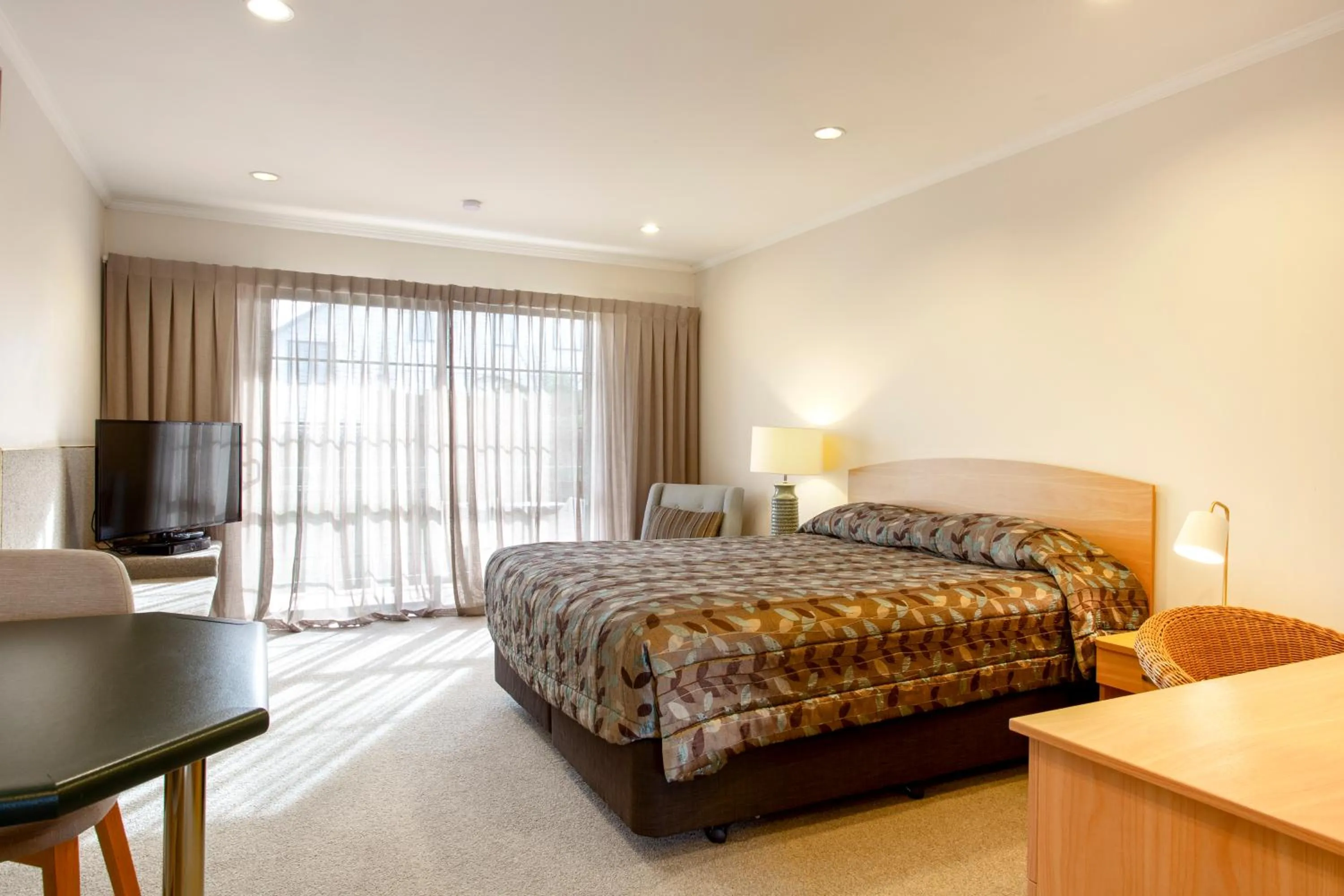 Bed in Greenlane Manor Motel