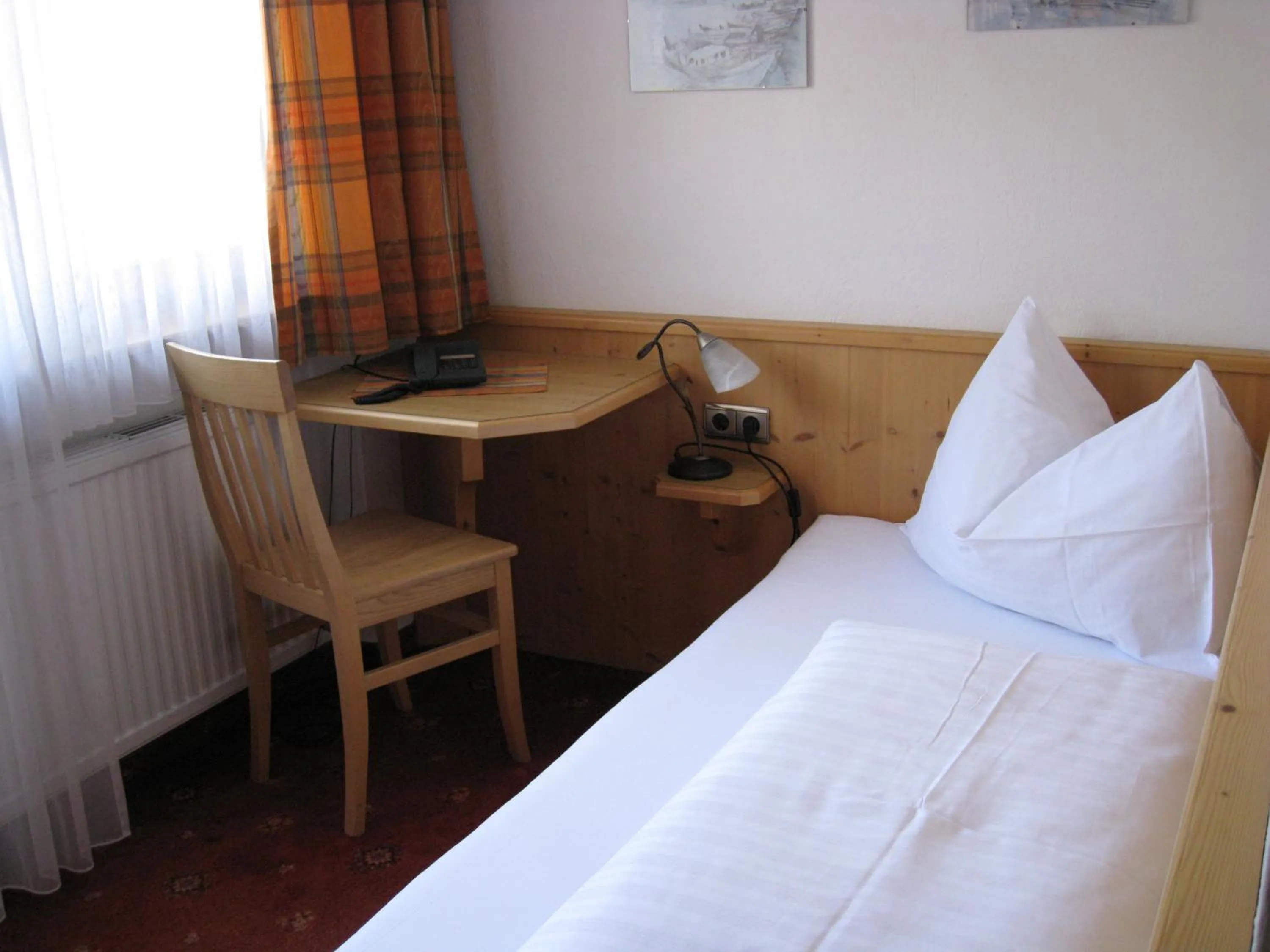 Bed in Apart Hotel Garni Strasser