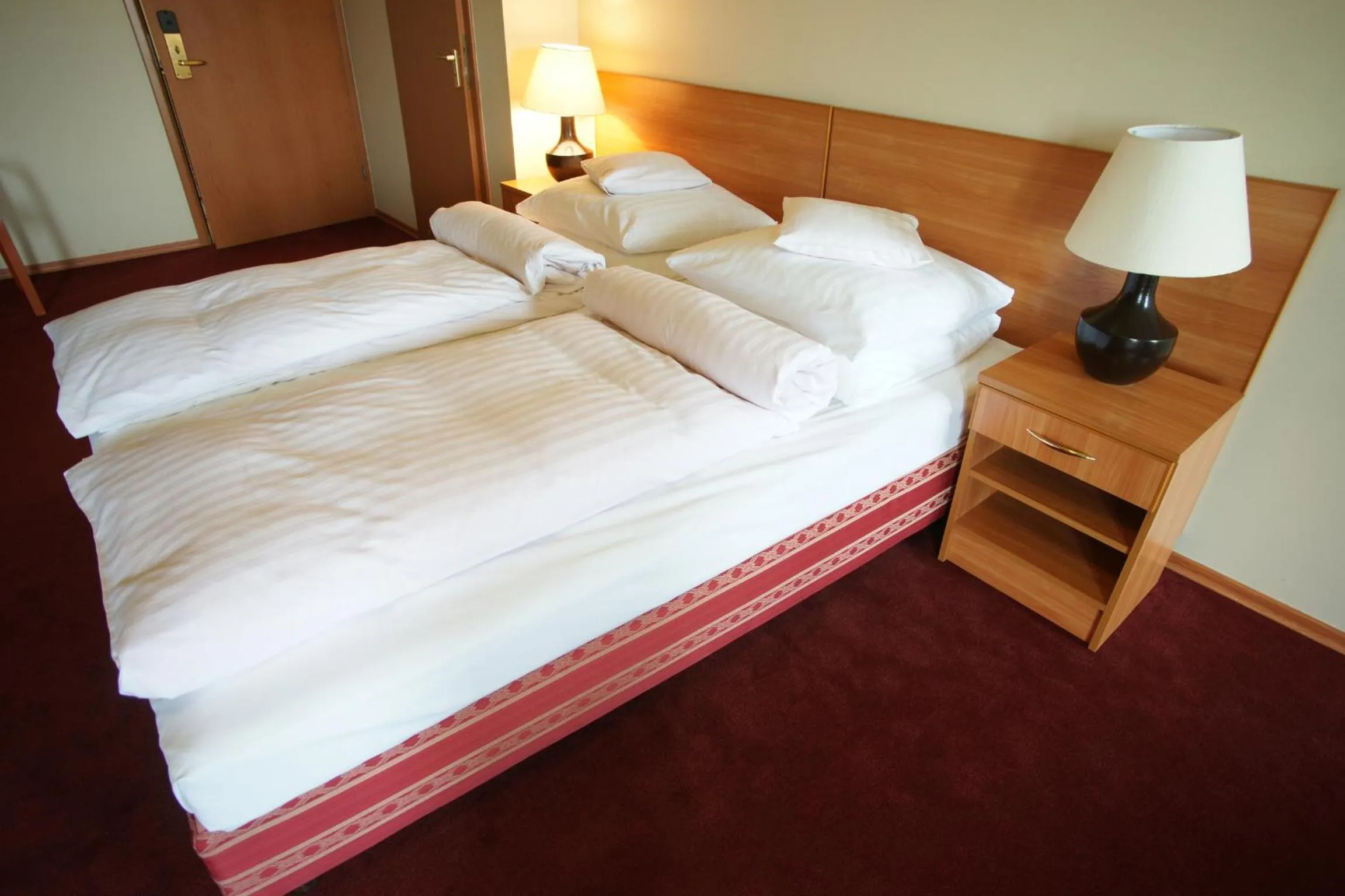 Bed in Hotel Grodzki