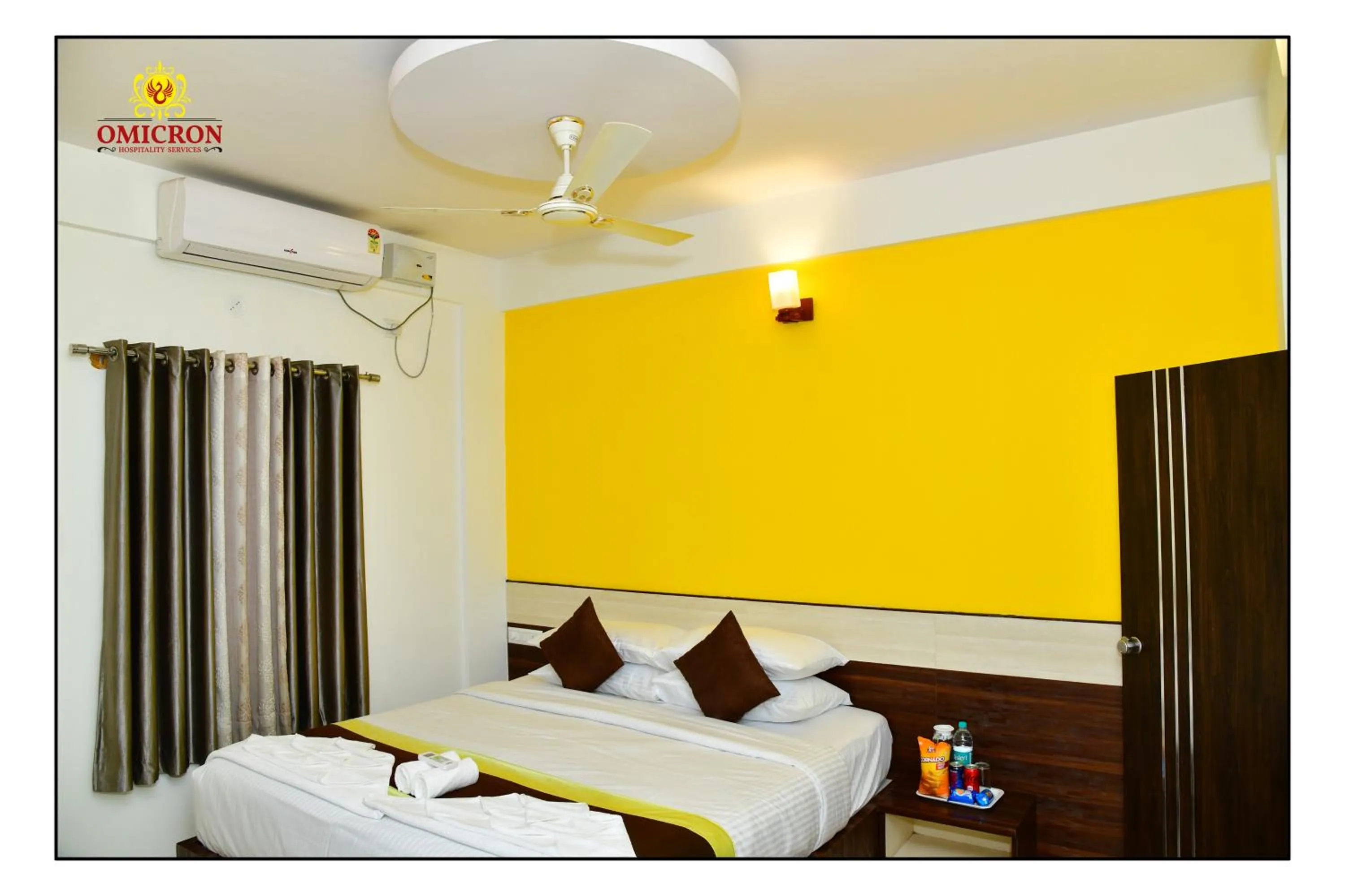 Bed in Hotel Omicron 1 BHK Studio room