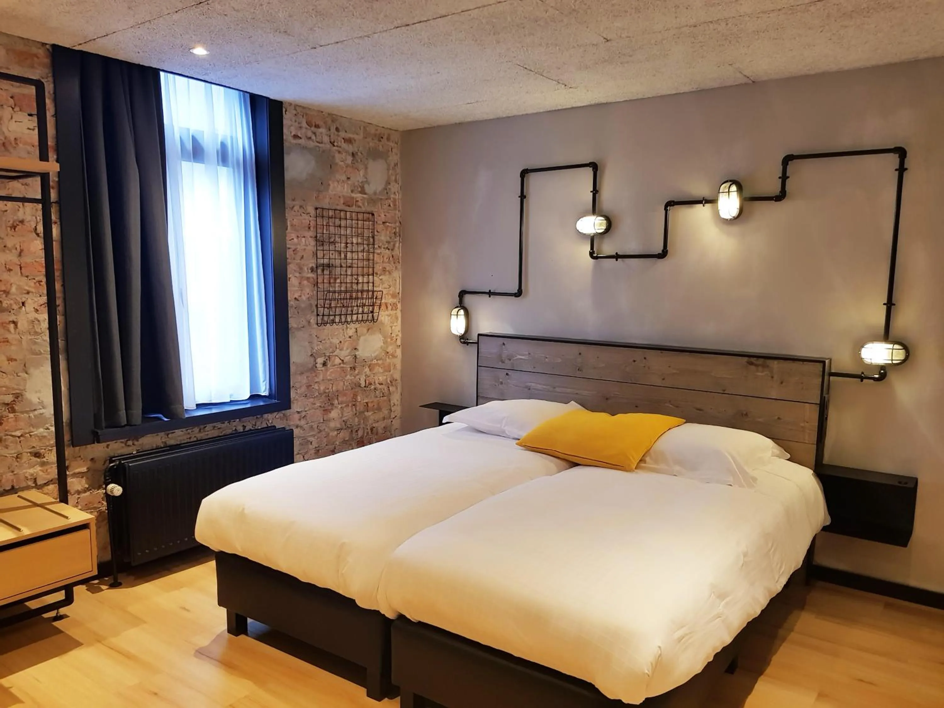 Bed in Upstairs Hotel