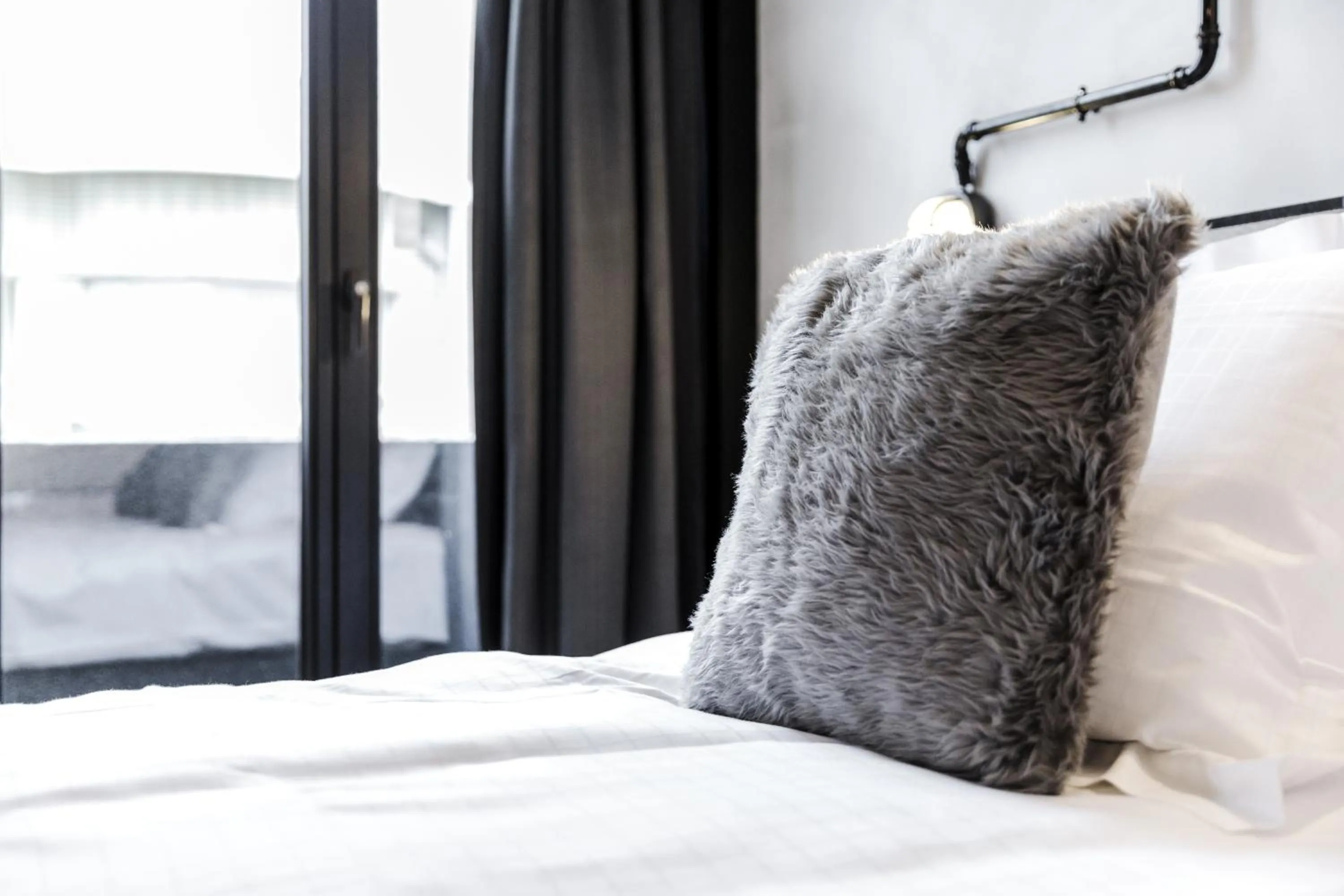 Bed in Upstairs Hotel