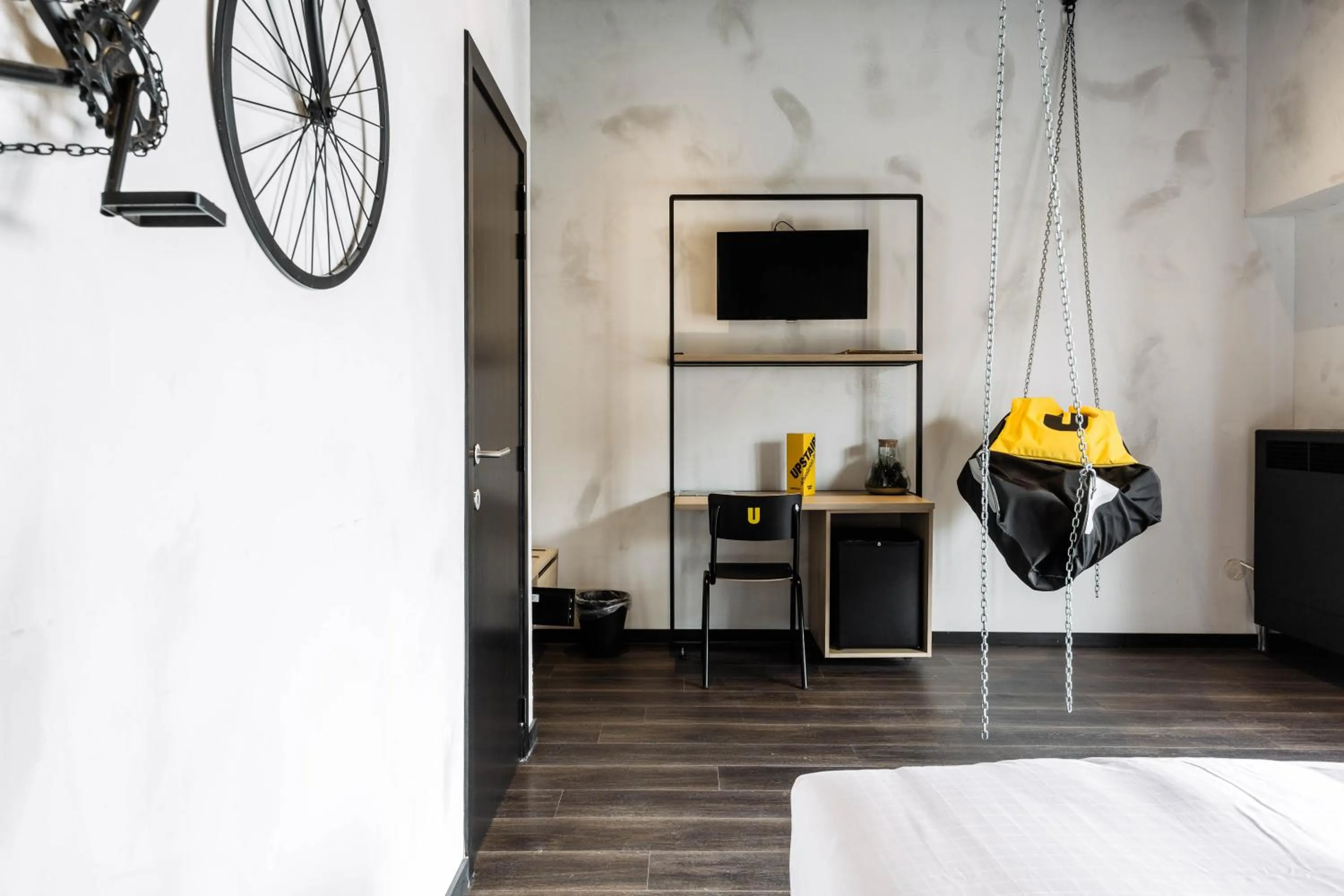 Bed in Upstairs Hotel